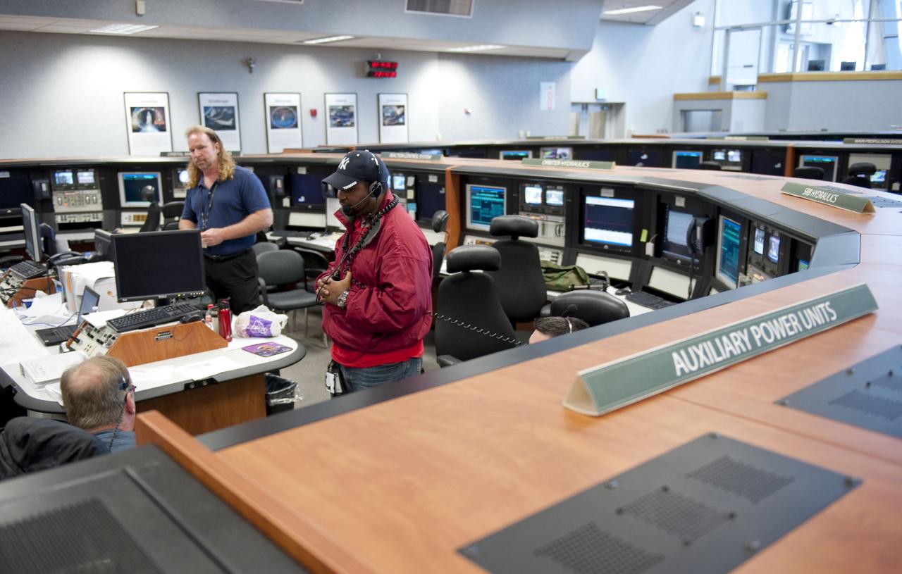 CAPE CANAVERAL, Fla. -- At NASA Kennedy Space Center's Launch Control Center, teams monitor the testing of the Load Control Assembly-2 (LCA-2) located in space shuttle Endeavour's aft section.    Located in the orbiter's aft avionics bay 5, the LCA-2 assembly, which feeds power to the fuel line heaters, is believed to have caused the heaters for Endeavour's auxiliary power unit-1 (APU-1) to fail April 29 during the first launch attempt for the STS-134 mission. STS-134 will deliver the Express Logistics Carrier-3, Alpha Magnetic Spectrometer-2 (AMS), a high-pressure gas tank and additional spare parts for the Dextre robotic helper to the International Space Station. The mission also will be the final spaceflight for Endeavour. For more information, visit www.nasa.gov/mission_pages/shuttle/shuttlemissions/sts134/index.html. Photo credit: NASA/Kim Shiflett.