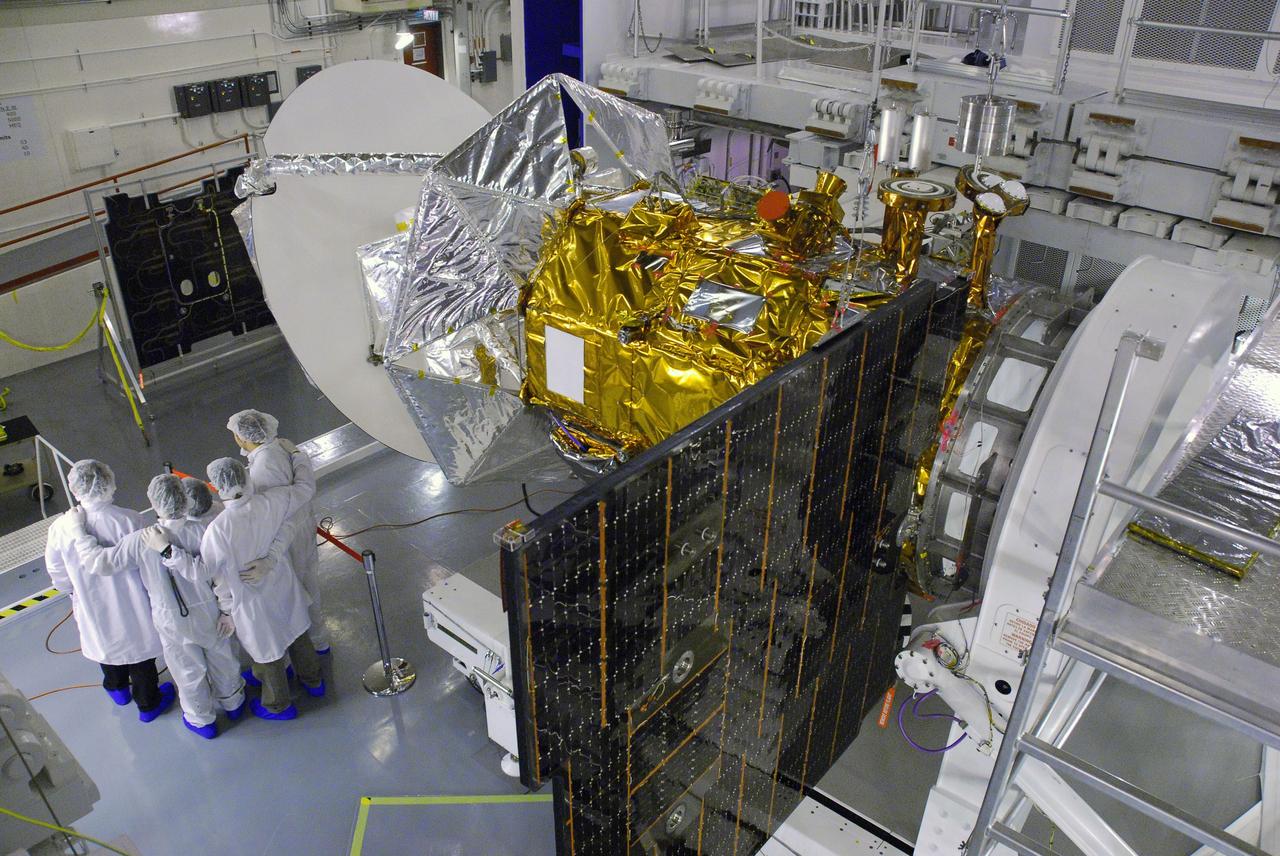 VANDENBERG AIR FORCE BASE, Calif. -- In Space Systems International's Payload Processing Facility at Vandenberg Air Force Base in California, technicians prepare to close the solar arrays on the Aquarius/SAC-D spacecraft.     Following final tests, the spacecraft will be integrated to a United Launch Alliance Delta II rocket in preparation for the targeted June launch. Aquarius, the NASA-built primary instrument on the SAC-D spacecraft, will provide new insights into how variations in ocean surface salinity relate to fundamental climate processes on its three-year mission. Photo credit: NASA/VAFB