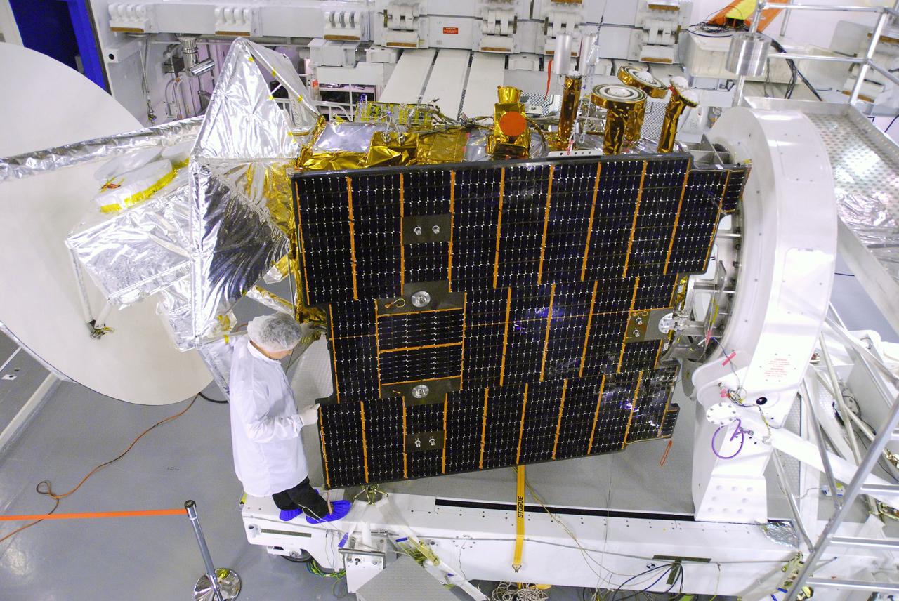 VANDENBERG AIR FORCE BASE, Calif. -- In Space Systems International's Payload Processing Facility at Vandenberg Air Force Base in California, technicians prepare to close the solar arrays on the Aquarius/SAC-D spacecraft.     Following final tests, the spacecraft will be integrated to a United Launch Alliance Delta II rocket in preparation for the targeted June launch. Aquarius, the NASA-built primary instrument on the SAC-D spacecraft, will provide new insights into how variations in ocean surface salinity relate to fundamental climate processes on its three-year mission. Photo credit: NASA/VAFB