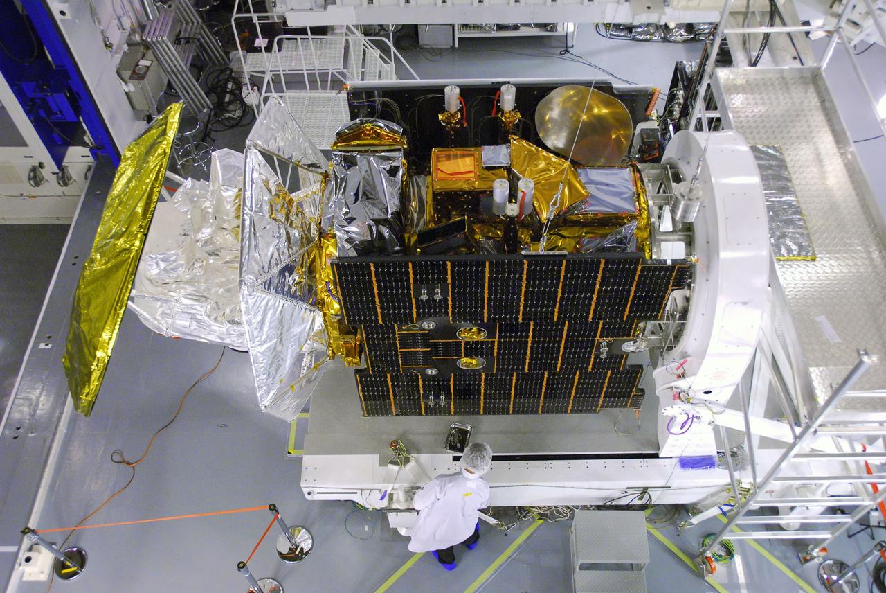VANDENBERG AIR FORCE BASE, Calif. -- In Space Systems International's Payload Processing Facility at Vandenberg Air Force Base in California, technicians prepare to test the solar array after its integration to the Aquarius/SAC-D spacecraft.   Following final tests, the spacecraft will be integrated to a United Launch Alliance Delta II rocket in preparation for the targeted June launch. Aquarius, the NASA-built primary instrument on the SAC-D spacecraft, will provide new insights into how variations in ocean surface salinity relate to fundamental climate processes on its three-year mission. Photo credit: NASA/VAFB