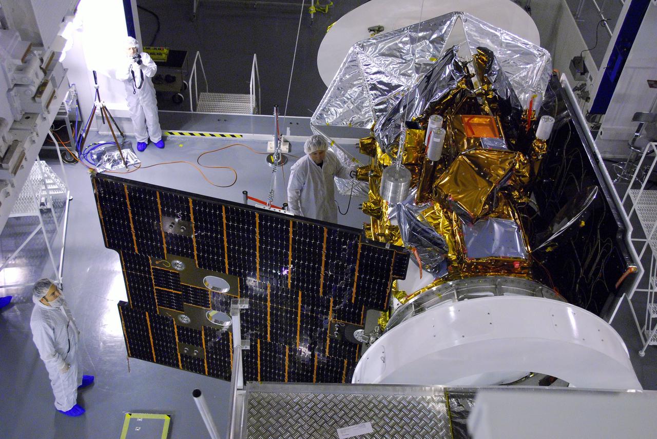 VANDENBERG AIR FORCE BASE, Calif. -- In Space Systems International's Payload Processing Facility at Vandenberg Air Force Base in California, technicians  extend a solar array on the Aquarius/SAC-D spacecraft to test the release mechanism sequence for the array using signal commands.    Following final tests, the spacecraft will be integrated to a United Launch Alliance Delta II rocket in preparation for the targeted June launch. Aquarius, the NASA-built primary instrument on the SAC-D spacecraft, will provide new insights into how variations in ocean surface salinity relate to fundamental climate processes on its three-year mission. Photo credit: NASA/VAFB