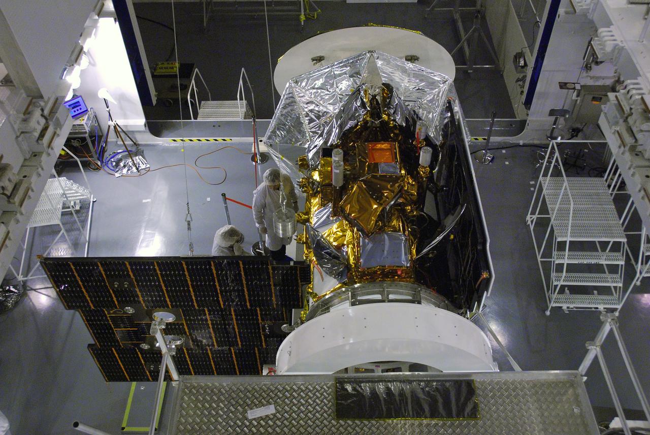 VANDENBERG AIR FORCE BASE, Calif. -- In Space Systems International's Payload Processing Facility at Vandenberg Air Force Base in California, technicians  extend a solar array on the Aquarius/SAC-D spacecraft to test the release mechanism sequence for the array using signal commands.    Following final tests, the spacecraft will be integrated to a United Launch Alliance Delta II rocket in preparation for the targeted June launch. Aquarius, the NASA-built primary instrument on the SAC-D spacecraft, will provide new insights into how variations in ocean surface salinity relate to fundamental climate processes on its three-year mission. Photo credit: NASA/VAFB