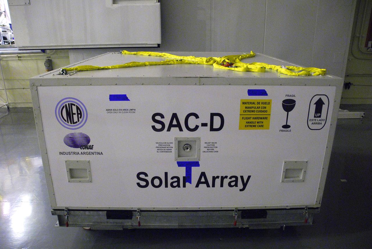 VANDENBERG AIR FORCE BASE, Calif. -- In Space Systems International's Payload Processing Facility at Vandenberg Air Force Base in California, technicians have removed the second solar array that will be integrated to the Aquarius/SAC-D spacecraft from its protective container.  Following final tests, the spacecraft will be integrated to a United Launch Alliance Delta II rocket in preparation for the targeted June launch. Aquarius, the NASA-built primary instrument on the SAC-D spacecraft, will provide new insights into how variations in ocean surface salinity relate to fundamental climate processes on its three-year mission. Photo credit: NASA/VAFB