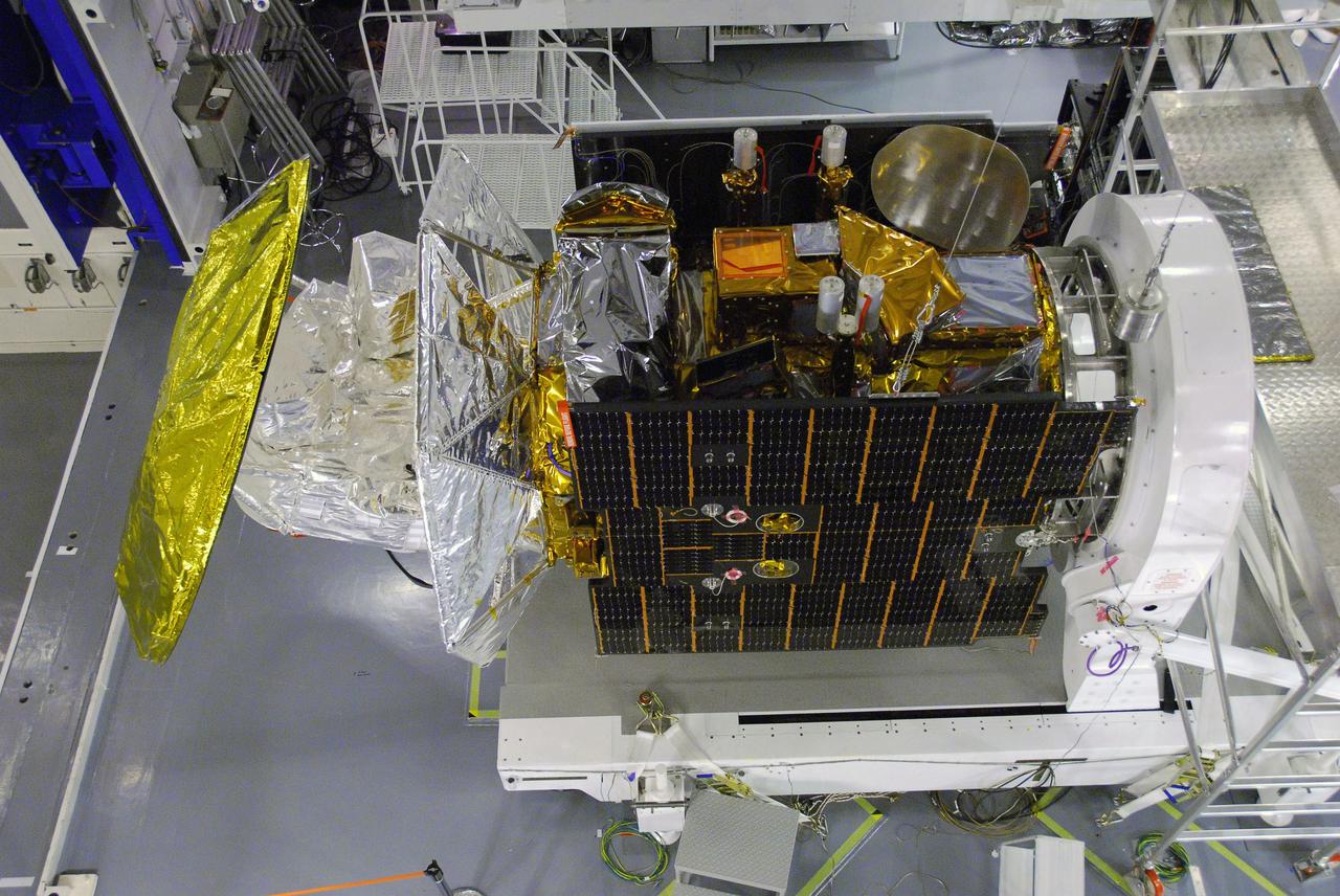 VANDENBERG AIR FORCE BASE, Calif. -- In Space Systems International's Payload Processing Facility at Vandenberg Air Force Base in California, technicians prepare to test the second solar array after integration to the Aquarius/SAC-D spacecraft.   Following final tests, the spacecraft will be integrated to a United Launch Alliance Delta II rocket in preparation for the targeted June launch. Aquarius, the NASA-built primary instrument on the SAC-D spacecraft, will provide new insights into how variations in ocean surface salinity relate to fundamental climate processes on its three-year mission. Photo credit: NASA/VAFB