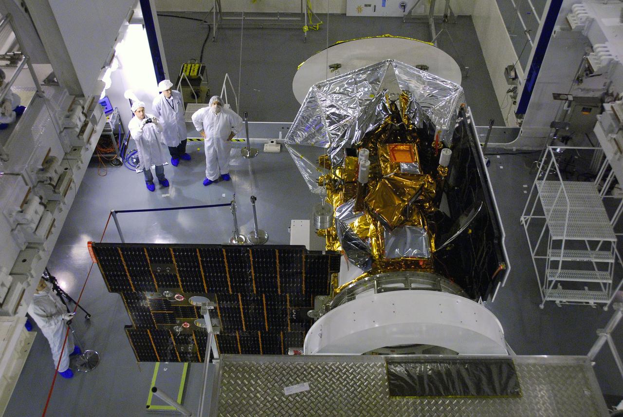 VANDENBERG AIR FORCE BASE, Calif. -- In Space Systems International's Payload Processing Facility at Vandenberg Air Force Base in California, technicians  extend the second solar array on the Aquarius/SAC-D spacecraft to test the release mechanism sequence for the array using signal commands.    Following final tests, the spacecraft will be integrated to a United Launch Alliance Delta II rocket in preparation for the targeted June launch. Aquarius, the NASA-built primary instrument on the SAC-D spacecraft, will provide new insights into how variations in ocean surface salinity relate to fundamental climate processes on its three-year mission. Photo credit: NASA/VAFB