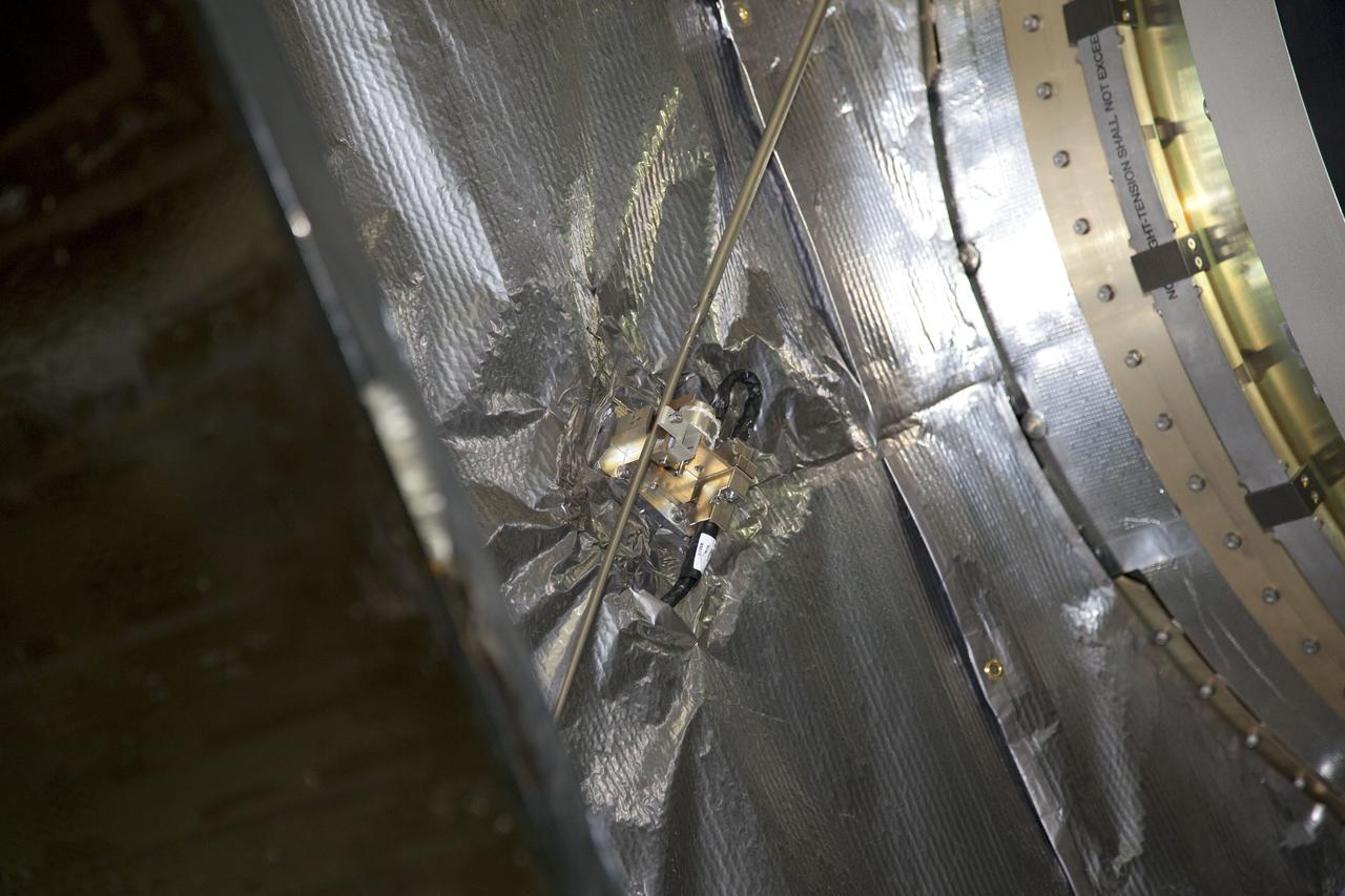 TITUSVILLE, Fla. -- In the Astrotech payload processing facility in Titusville, Fla., the Radio and Plasma Wave Sensor, called WAVES for short, will be installed, deployed and tested on to NASA's Juno spacecraft. WAVES is a science boom instrument that will measure radio and plasma waves emitting from Jupiter. Juno is scheduled to launch aboard an Atlas V rocket from Cape Canaveral, Fla., on Aug. 5, 2011, reaching Jupiter in July 2016. The spacecraft will orbit the giant planet more than 30 times, skimming to within 3,000 miles above its cloud tops, for about one year. With its suite of science instruments, the spacecraft will investigate the existence of a solid planetary core, map Jupiter's intense magnetic field, measure the amount of water and ammonia in the deep atmosphere, and observe the planet's auroras. For more information visit, www.nasa.gov/mission_pages/juno. Photo credit: NASA/Frankie Martin