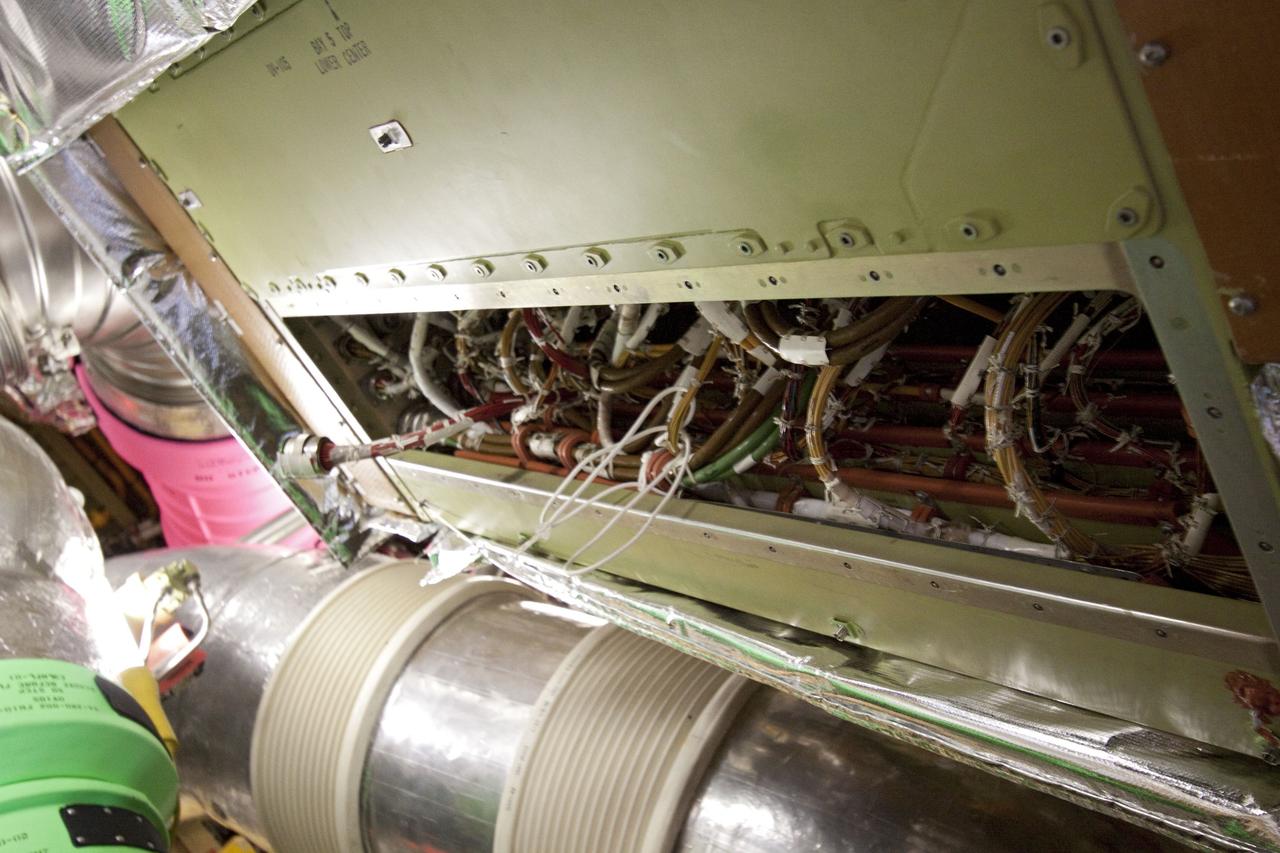 CAPE CANAVERAL, Fla. -- At NASA Kennedy Space Center's Launch Pad 39A, the Load Control Assembly-2 (LCA-2) has been replaced inside of space shuttle Endeavour. Located in Endeavour's aft avionics bay 5, the LCA-2, which distributes power to nine shuttle systems, is believed to have caused fuel line heaters for Endeavour's auxiliary power unit-1 (APU-1) to fail April 29 during the first launch attempt for the STS-134 mission and has been replaced. Systems will be retested before the launch is rescheduled. STS-134 will deliver the Express Logistics Carrier-3, Alpha Magnetic Spectrometer-2 (AMS), a high-pressure gas tank and additional spare parts for the Dextre robotic helper to the International Space Station. The mission also will be the final spaceflight for Endeavour. For more information, visit www.nasa.gov/mission_pages/shuttle/shuttlemissions/sts134/index.html. Photo credit: NASA/Troy Cryder