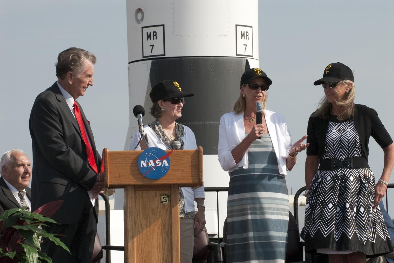 CAPE CANAVERAL, Fla. -- From left, NBC reporter Jay Barbree and Alice Wackermann, Julie Jenkins (at microphone) and Laura Churchley, daughters of astronaut Alan Shepard, participate in a celebration at Complex 5/6 on Cape Canaveral Air Force Station in Florida.    The celebration was held at the launch site of the first U.S. manned spaceflight May 5, 1961, to mark the 50th anniversary of the flight.  Fifty years ago, astronaut Alan Shepard lifted off inside the Mercury capsule, "Freedom 7," atop an 82-foot-tall Mercury-Redstone rocket at 9:34 a.m. EST, sending him on a remarkably successful, 15-minute suborbital flight. The event was attended by more than 200 workers from the original Mercury program and included a re-creation of Shepard's flight and recovery, as well as a tribute to his contributions as a moonwalker on the Apollo 14 lunar mission. For more information, visit www.nasa.gov/topics/history/milestones/index.html. Photo credit: NASA/Kim Shiflett