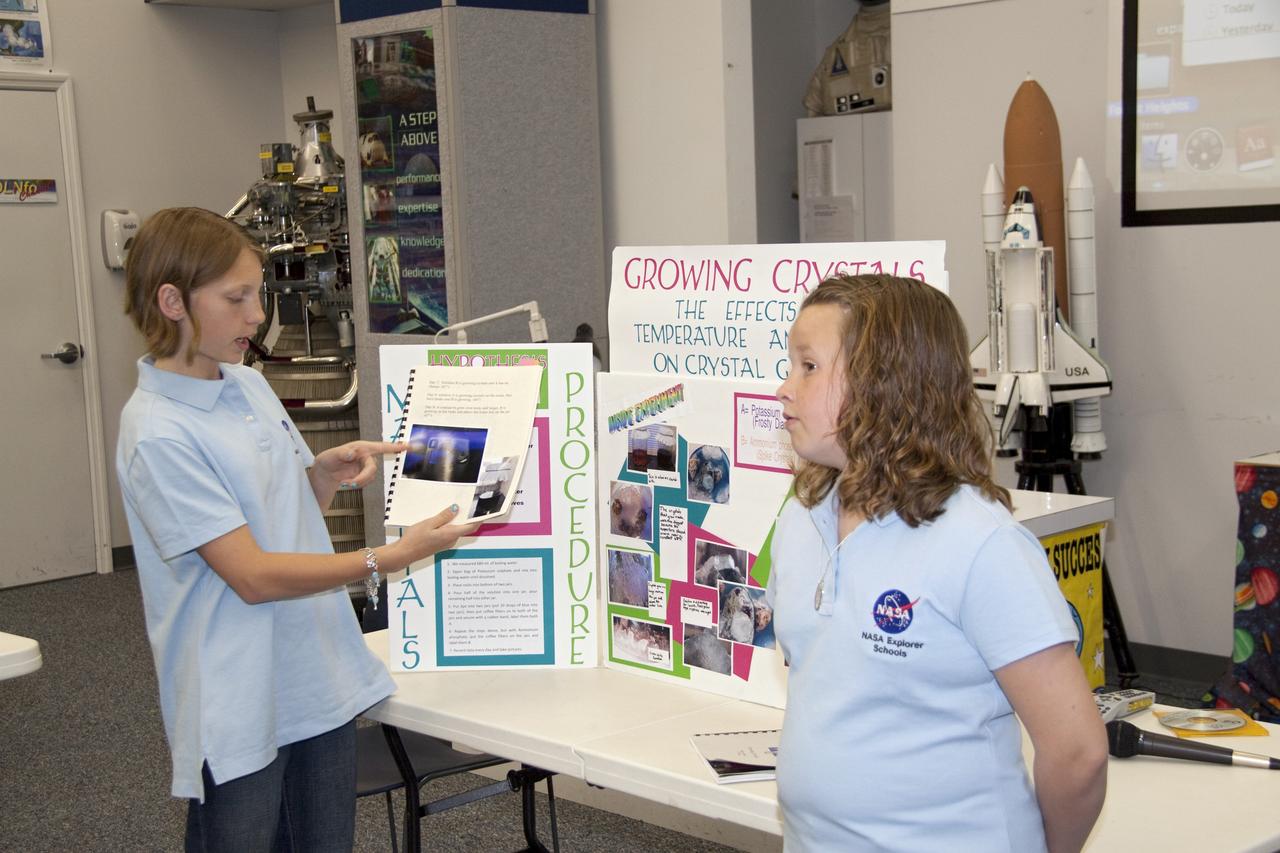 CAPE CANAVERAL, Fla. -- Students present their investigation project to their peers, scientists, engineers and education specialists during the NASA Explorer Schools Symposium at Kennedy Space Center in Florida. About 60 fourth- through 12-grade students from across the nation are at the center May 4-7 participating in tours of processing and launch facilities and the U.S. Astronaut Hall of Fame, as well as several educational activities and a career panel question-and-answer session. About 30 teachers will receive professional development opportunities during the symposium. The participants were competitively selected after they completed an original investigation focused on existing NASA missions or research interests. Photo Credit: NASA/Jack Pfaller