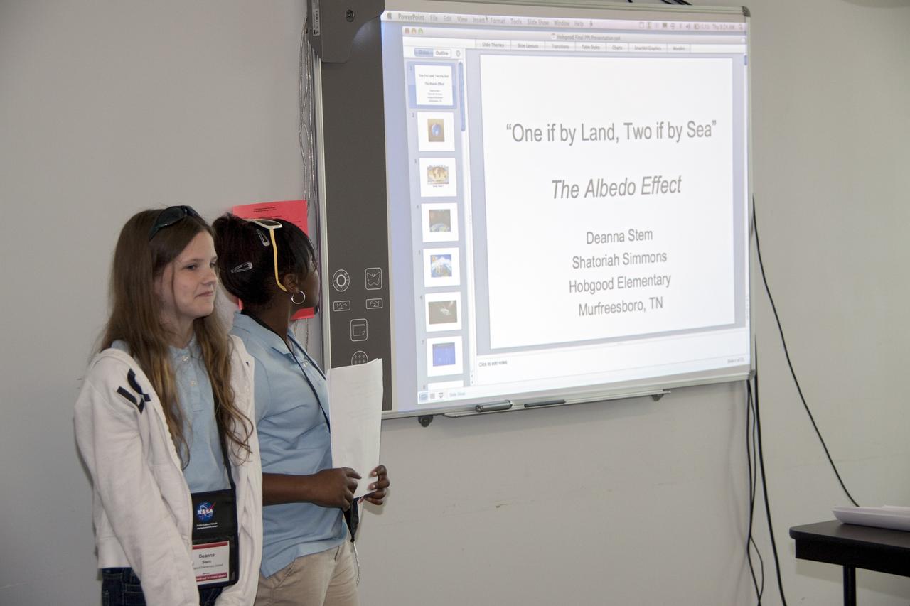 CAPE CANAVERAL, Fla. -- Students present their investigation project to their peers, scientists, engineers and education specialists during the NASA Explorer Schools Symposium at Kennedy Space Center in Florida. About 60 fourth- through 12-grade students from across the nation are at the center May 4-7 participating in tours of processing and launch facilities and the U.S. Astronaut Hall of Fame, as well as several educational activities and a career panel question-and-answer session. About 30 teachers will receive professional development opportunities during the symposium. The participants were competitively selected after they completed an original investigation focused on existing NASA missions or research interests. Photo Credit: NASA/Jack Pfaller