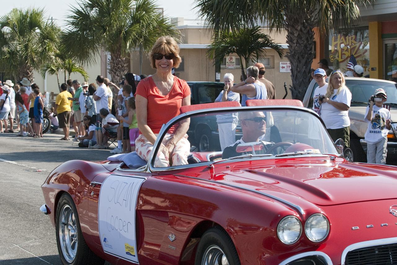 Cape Canaveral, Fla. – Suzan Cooper, representing her late husband Mercury 7 astronaut Gordon Cooper, waves to spectators from a vintage Chevrolet Corvette during a commemorative parade in Cocoa Beach, Fla. A group of current and retired NASA astronauts gathered in Cocoa Beach to commemorate NASA’s 50 years of accomplishments and to honor astronaut Alan Shepard’s Mercury/Freedom 7 suborbital flight May 5, 1961.The event was marked by a parade, with the astronauts riding in a fleet of Chevrolet Corvettes that corresponded with the time period of their space missions. Members of the Cape Kennedy Corvette Club, a group established in 1967, escorted almost two dozen astronauts or their family representatives in club members' cars. The Corvette parade started at the glass bank building, at 9:34 a.m. EDT, the same time Shepard launched into space. Photo credit: NASA/Kim Shiflett
