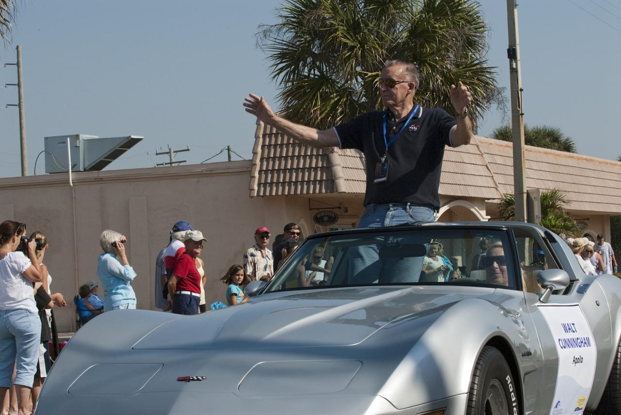Cape Canaveral, Fla. -- Retired Apollo astronaut Walt Cunningham greets spectators from a vintage Chevrolet Corvette during a commemorative parade in Cocoa Beach, Fla. A group of current and retired NASA astronauts gathered in Cocoa Beach to commemorate NASA’s 50 years of accomplishments and to honor astronaut Alan Shepard’s Mercury/Freedom 7 suborbital flight May 5, 1961.The event was marked by a parade, with the astronauts riding in a fleet of Chevrolet Corvettes that corresponded with the time period of their space missions. Members of the Cape Kennedy Corvette Club, a group established in 1967, escorted almost two dozen astronauts or their family representatives in club members' cars. The Corvette parade started at the glass bank building, at 9:34 a.m. EDT, the same time Shepard launched into space. Photo credit: NASA/Kim Shiflett