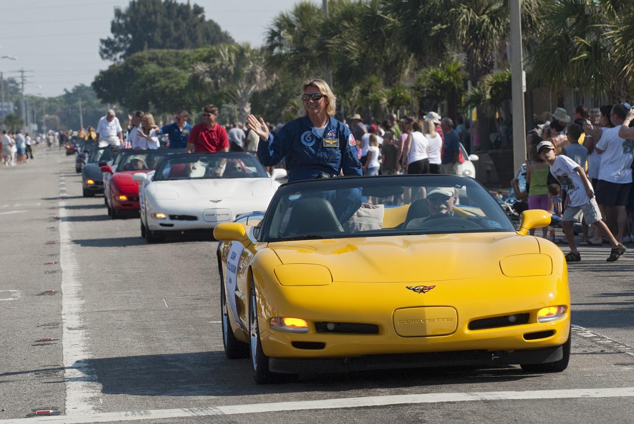 Cape Canaveral, Fla. -- Retired space shuttle astronaut Susan Kilrain waves to spectators from a Chevrolet Corvette during a commemorative parade in Cocoa Beach, Fla. A group of current and retired NASA astronauts gathered in Cocoa Beach to commemorate NASA’s 50 years of accomplishments and to honor astronaut Alan Shepard’s Mercury/Freedom 7 suborbital flight May 5, 1961.The event was marked by a parade, with the astronauts riding in a fleet of Chevrolet Corvettes that corresponded with the time period of their space missions. Members of the Cape Kennedy Corvette Club, a group established in 1967, escorted almost two dozen astronauts or their family representatives in club members' cars. The Corvette parade started at the glass bank building, at 9:34 a.m. EDT, the same time Shepard launched into space. Photo credit: NASA/Kim Shiflett