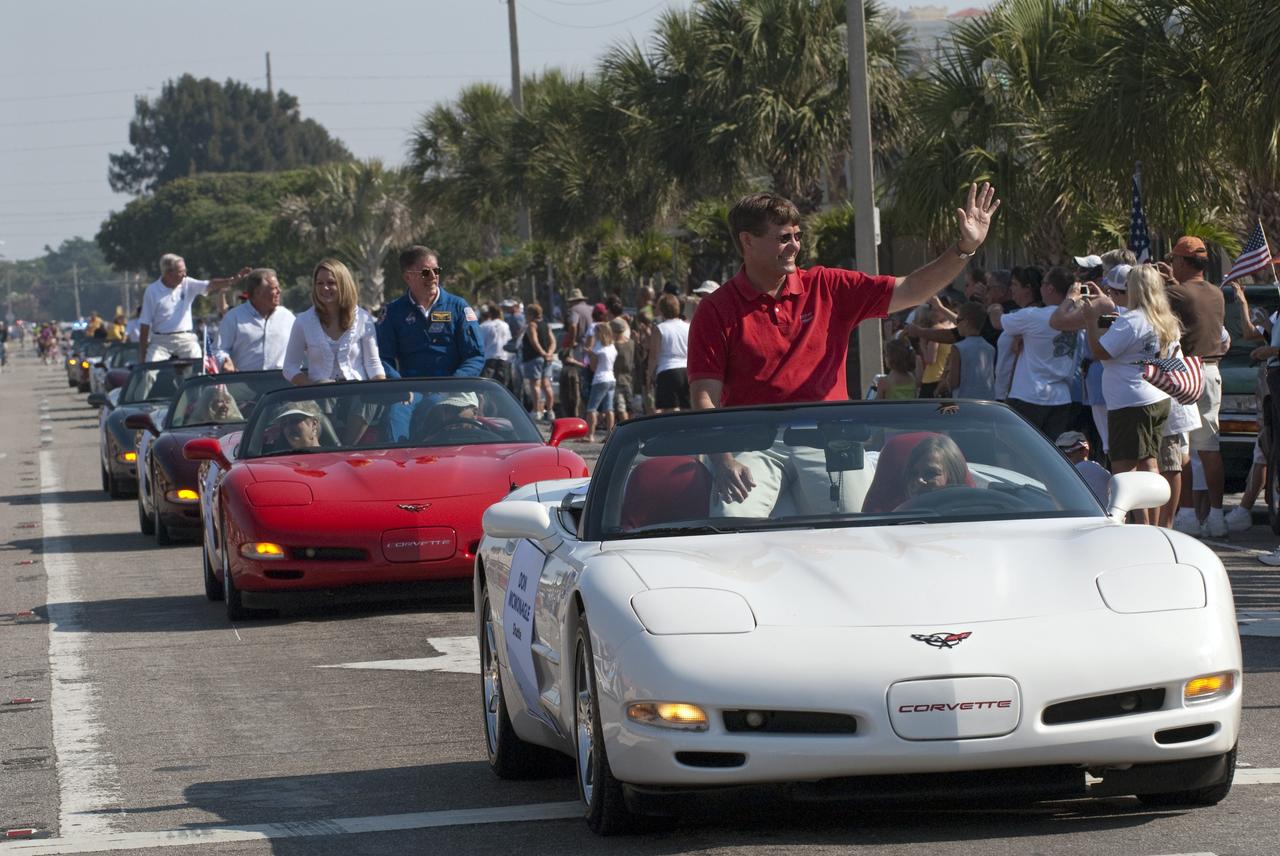 Cape Canaveral, Fla. -- Retired space shuttle astronaut Don McMonagle waves to spectators from a vintage Chevrolet Corvette during a commemorative parade in Cocoa Beach, Fla. A group of current and retired NASA astronauts gathered in Cocoa Beach to commemorate NASA’s 50 years of accomplishments and to honor astronaut Alan Shepard’s Mercury/Freedom 7 suborbital flight May 5, 1961.The event was marked by a parade, with the astronauts riding in a fleet of Chevrolet Corvettes that corresponded with the time period of their space missions. Members of the Cape Kennedy Corvette Club, a group established in 1967, escorted almost two dozen astronauts or their family representatives in club members' cars. The Corvette parade started at the glass bank building, at 9:34 a.m. EDT, the same time Shepard launched into space. Photo credit: NASA/Kim Shiflett
