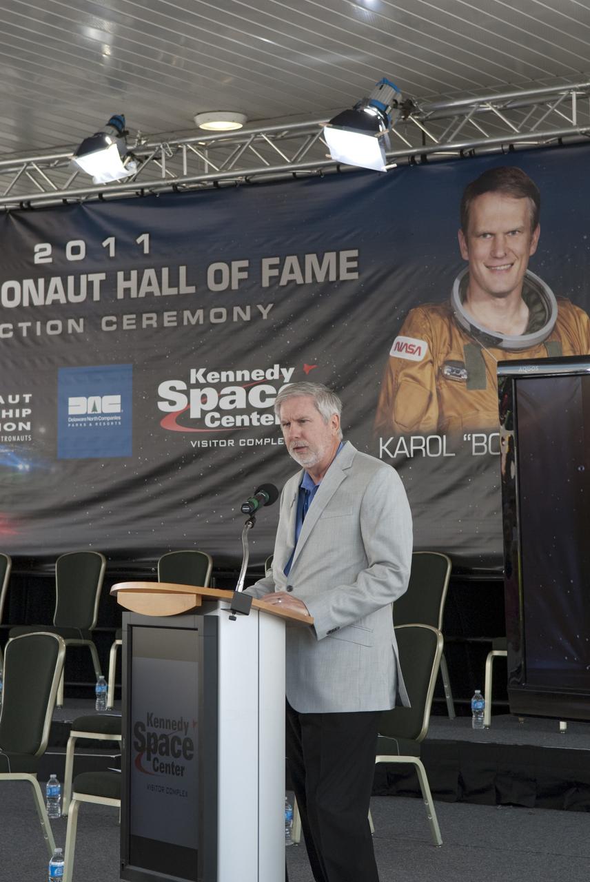 Cape Canaveral, Fla. -- At the 2011 U.S. Astronaut Hall of Fame induction ceremony at NASA's Kennedy Space Center Visitor Complex in Florida, Bill Moore, Visitor Complex chief operating officer, addresses the inductees and visitors with opening remarks.              Hall of Fame astronauts and visitors gathered to honor 2011 inductees Karol "Bo" Bobko and Susan Helms. During his 19 years in the astronaut program, Bobko flew on three space shuttle missions and logged more than 386 hours in space. He served as pilot during the first voyage of space shuttle Challenger aboard STS-6 in April 1983 and as commander during the maiden flight of space shuttle Atlantis aboard STS-51J in October 1985. Helms, a five-time space shuttle astronaut, has logged 5,064 hours in space. During her stay onboard the International Space Station as a member of the Expedition-2 crew in 2001, Helms performed a world record 8 hour and 56 minute spacewalk. Bobko and Helms join the ranks of the U.S. Astronaut Hall of Fame bringing the number of space explorers enshrined in the Hall of Fame to 79. Photo Credit: NASA/Jim Grossmann