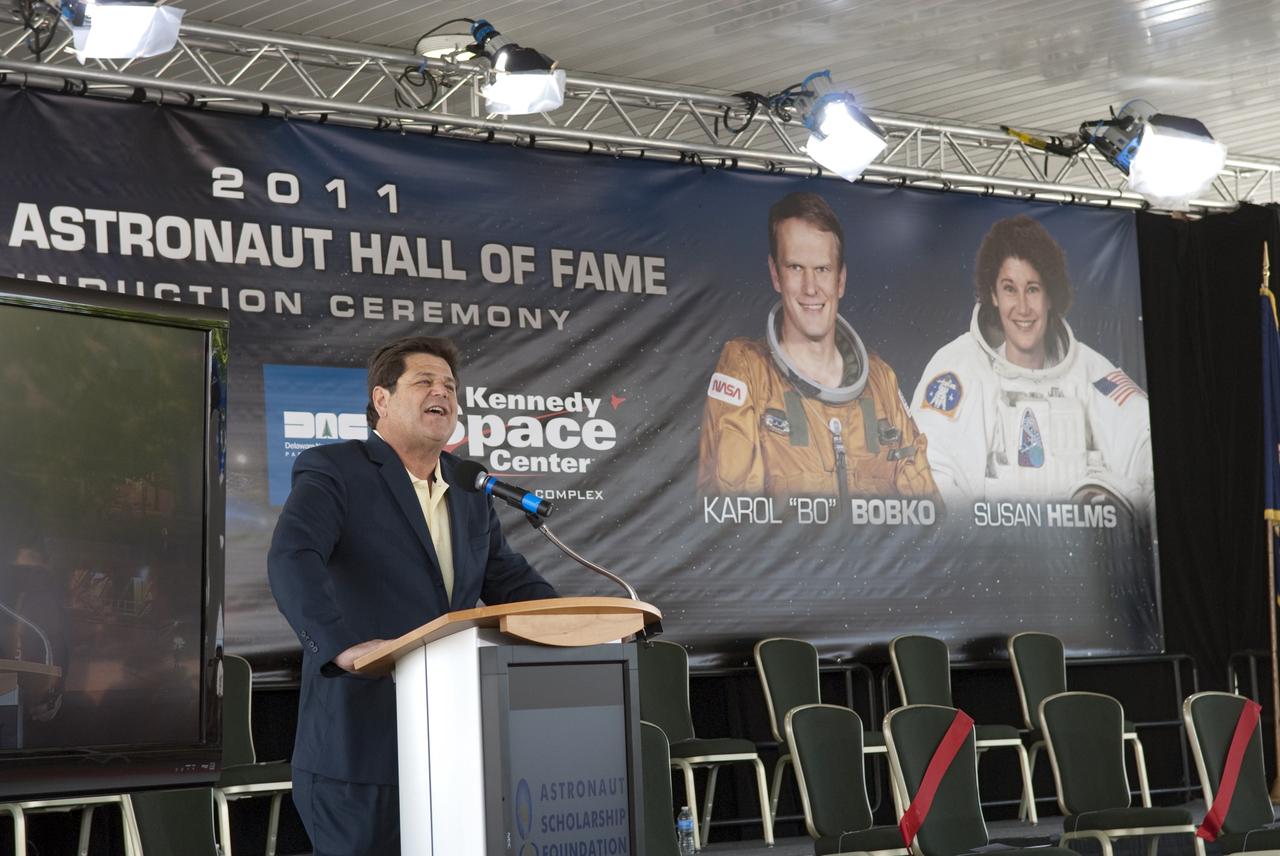 Cape Canaveral, Fla. -- At the 2011 U.S. Astronaut Hall of Fame induction ceremony at NASA's Kennedy Space Center Visitor Complex in Florida, Master of Ceremonies John Zarrella addresses the inductees and visitors with opening remarks.            Hall of Fame astronauts and visitors gathered to honor 2011 inductees Karol "Bo" Bobko and Susan Helms. During his 19 years in the astronaut program, Bobko flew on three space shuttle missions and logged more than 386 hours in space. He served as pilot during the first voyage of space shuttle Challenger aboard STS-6 in April 1983 and as commander during the maiden flight of space shuttle Atlantis aboard STS-51J in October 1985. Helms, a five-time space shuttle astronaut, has logged 5,064 hours in space. During her stay onboard the International Space Station as a member of the Expedition-2 crew in 2001, Helms performed a world record 8 hour and 56 minute spacewalk. Bobko and Helms join the ranks of the U.S. Astronaut Hall of Fame bringing the number of space explorers enshrined in the Hall of Fame to 79. Photo Credit: NASA/Jim Grossmann