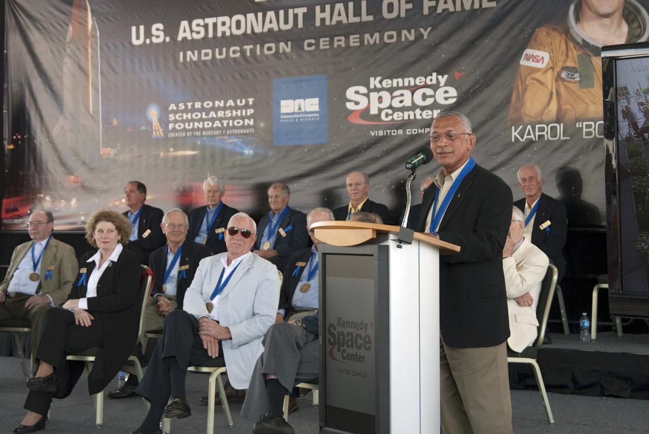 Cape Canaveral, Fla. -- Hall of Fame astronaut and present NASA Administrator Charles Bolden addresses the spectators at the 2011 U.S. Astronaut Hall of Fame ceremony held at NASA's Kennedy Space Center Visitor Complex in Florida.       Hall of Fame astronauts and visitors gathered to honor 2011 inductees Karol "Bo" Bobko and Susan Helms. During his 19 years in the astronaut program, Bobko flew on three space shuttle missions and logged more than 386 hours in space. He served as pilot during the first voyage of space shuttle Challenger aboard STS-6 in April 1983 and as commander during the maiden flight of space shuttle Atlantis aboard STS-51J in October 1985. Helms, a five-time space shuttle astronaut, has logged 5,064 hours in space. During her stay onboard the International Space Station as a member of the Expedition-2 crew in 2001, Helms performed a world record 8 hour and 56 minute spacewalk. Bobko and Helms join the ranks of the U.S. Astronaut Hall of Fame bringing the number of space explorers enshrined in the Hall of Fame to 79. Photo Credit: NASA/Jim Grossmann
