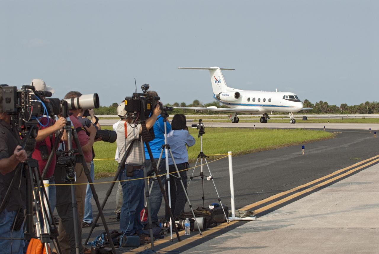 CAPE CANAVERAL, Fla. -- Media photographed the STS-134 crew as it arrived in a Shuttle Training Aircraft at NASA Kennedy Space Center's Shuttle Landing Facility in Florida. The astronauts are at Kennedy for final preparations for Endeavour's liftoff to the International Space Station scheduled for Monday, May 16 at 8:56 a.m. EDT.        Endeavour and its crew will deliver the Express Logistics Carrier-3, Alpha Magnetic Spectrometer-2 (AMS), a high-pressure gas tank and additional spare parts for the Dextre robotic helper to the station. This will be the final spaceflight for Endeavour. For more information visit, www.nasa.gov/mission_pages/shuttle/shuttlemissions/sts134/index.html. Photo credit: NASA/Kim Shiflett