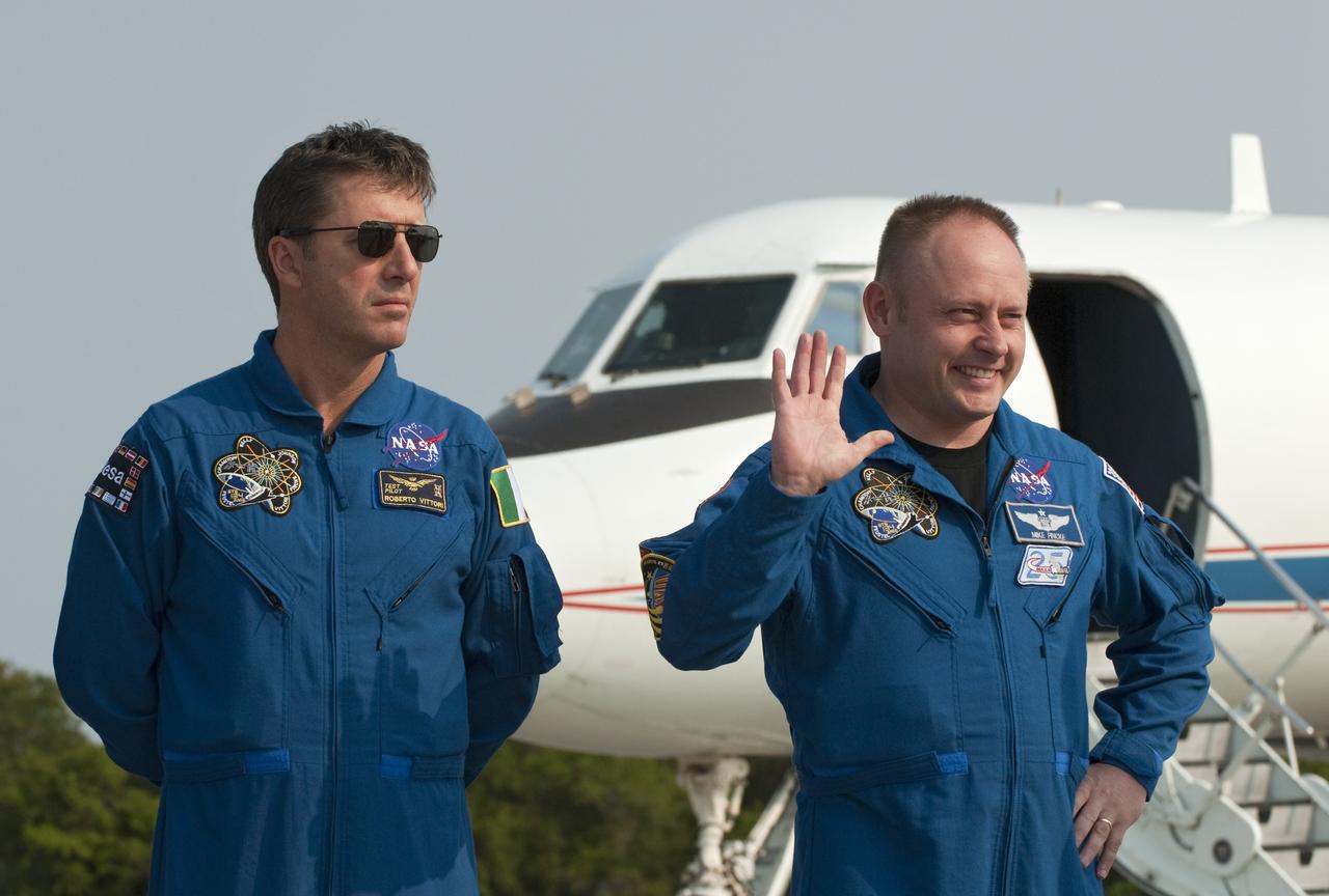 CAPE CANAVERAL, Fla. -- At the Shuttle Landing Facility at NASA's Kennedy Space Center in Florida, European Space Agency astronaut Roberto Vittori (left) and Michael Fincke, both mission specialists, are photographed after their arrival. The STS-134 crew members landed at about 9 a.m. EDT for final preparations for Endeavour's liftoff to the International Space Station scheduled for Monday, May 16 at 8:56 a.m.            Endeavour and its crew will deliver the Express Logistics Carrier-3, Alpha Magnetic Spectrometer-2 (AMS), a high-pressure gas tank and additional spare parts for the Dextre robotic helper to the station. This will be the final spaceflight for Endeavour. For more information visit, www.nasa.gov/mission_pages/shuttle/shuttlemissions/sts134/index.html. Photo credit: NASA/Kim Shiflett