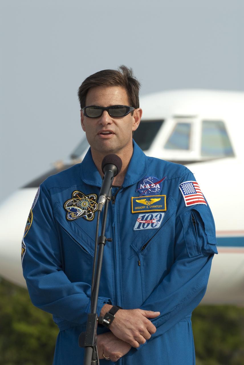 CAPE CANAVERAL, Fla. -- At the Shuttle Landing Facility at NASA's Kennedy Space Center in Florida, STS-134 Mission Specialist Greg Chamitoff is photographed as he speaks to media. The STS-134 crew members landed at about 9 a.m. EDT for final preparations for Endeavour's liftoff to the International Space Station scheduled for Monday, May 16 at 8:56 a.m. Endeavour and its crew will deliver the Express Logistics Carrier-3, Alpha Magnetic Spectrometer-2 (AMS), a high-pressure gas tank and additional spare parts for the Dextre robotic helper to the station. This will be the final spaceflight for Endeavour. For more information visit, www.nasa.gov/mission_pages/shuttle/shuttlemissions/sts134/index.html. Photo credit: NASA/Kim Shiflett