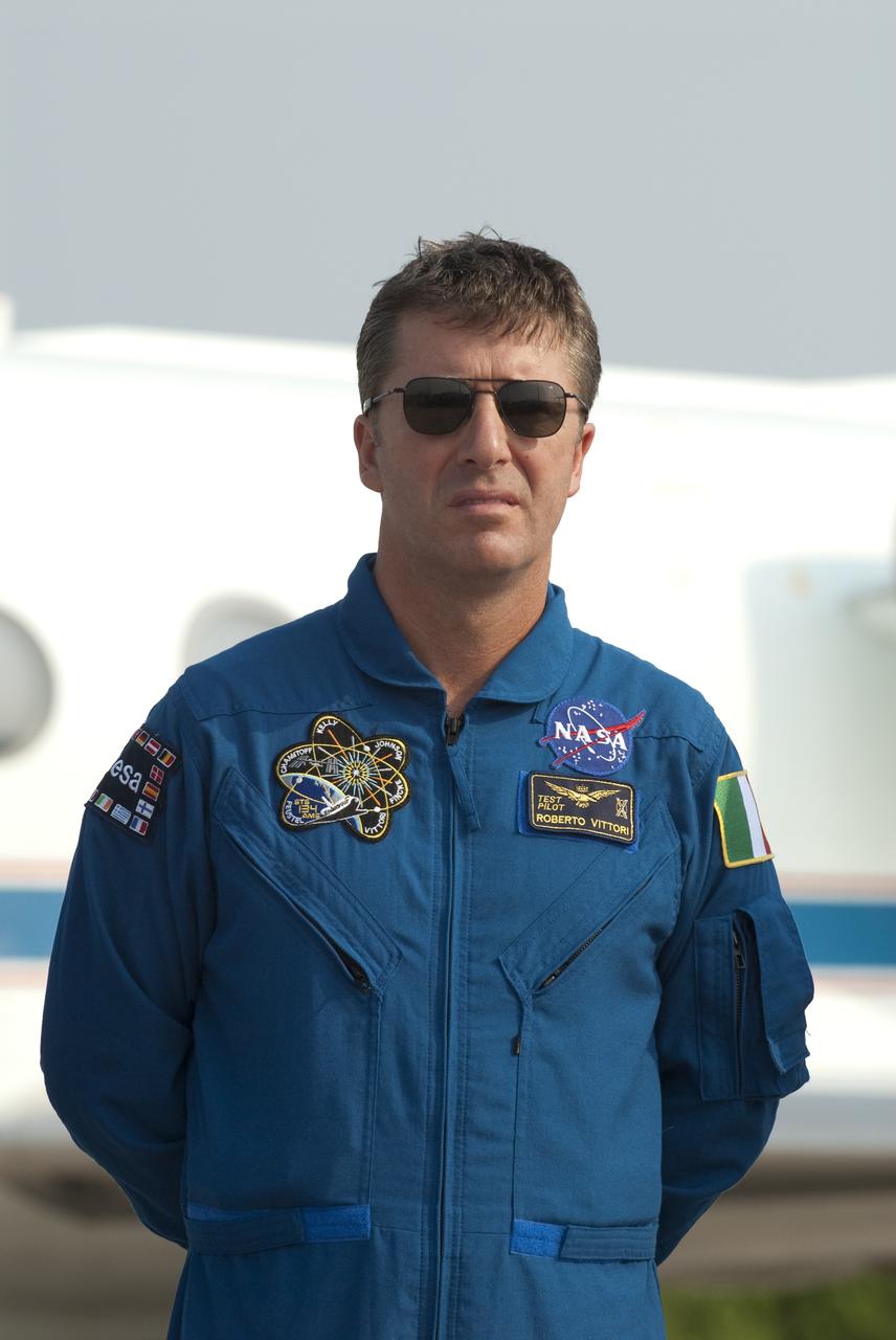 CAPE CANAVERAL, Fla. -- At the Shuttle Landing Facility at NASA's Kennedy Space Center in Florida, European Space Agency astronaut Roberto Vittori, STS-134 Mission Specialist, is photographed after his arrival. The STS-134 crew members landed at about 9 a.m. EDT for final preparations for Endeavour's liftoff to the International Space Station scheduled for Monday, May 16 at 8:56 a.m.         Endeavour and its crew will deliver the Express Logistics Carrier-3, Alpha Magnetic Spectrometer-2 (AMS), a high-pressure gas tank and additional spare parts for the Dextre robotic helper to the station. This will be the final spaceflight for Endeavour. For more information visit, www.nasa.gov/mission_pages/shuttle/shuttlemissions/sts134/index.html. Photo credit: NASA/Kim Shiflett