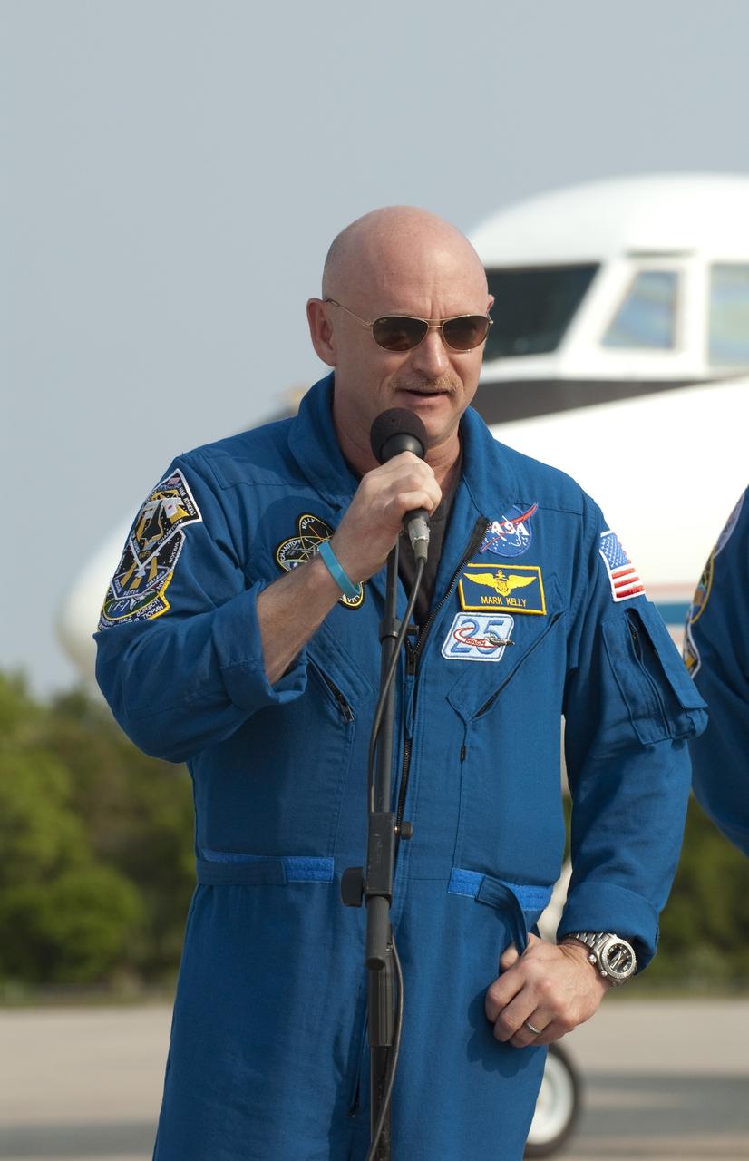 CAPE CANAVERAL, Fla. -- At the Shuttle Landing Facility at NASA's Kennedy Space Center in Florida, STS-134 Commander Mark Kelly is photographed as he speaks to media. The STS-134 crew members landed at about 9 a.m. EDT for final preparations for Endeavour's liftoff to the International Space Station scheduled for Monday, May 16 at 8:56 a.m. Endeavour and its crew will deliver the Express Logistics Carrier-3, Alpha Magnetic Spectrometer-2 (AMS), a high-pressure gas tank and additional spare parts for the Dextre robotic helper to the station. This will be the final spaceflight for Endeavour. For more information visit, www.nasa.gov/mission_pages/shuttle/shuttlemissions/sts134/index.html. Photo credit: NASA/Kim Shiflett