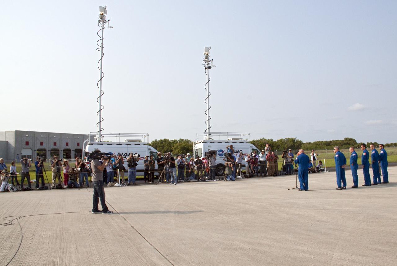 CAPE CANAVERAL, Fla. -- The STS-134 crew members arrived on the Shuttle Landing Facility at NASA's Kennedy Space Center in Florida at 9 a.m. EDT to get ready for space shuttle Endeavour's launch to the International Space Station scheduled for Monday, May 16 at 8:56 a.m. Facing the media are from left, Commander Mark Kelly, at the microphone, Pilot Greg H. Johnson, Mission Specialist Michael Fincke, European Space Agency astronaut Roberto Vittori, Andrew Feustel and Greg Chamitoff.          Endeavour and its crew will deliver the Express Logistics Carrier-3, Alpha Magnetic Spectrometer-2 (AMS), a high-pressure gas tank and additional spare parts for the Dextre robotic helper to the station. This will be the final spaceflight for Endeavour. For more information visit, www.nasa.gov/mission_pages/shuttle/shuttlemissions/sts134/index.html. Photo credit: NASA/Jack Pfaller