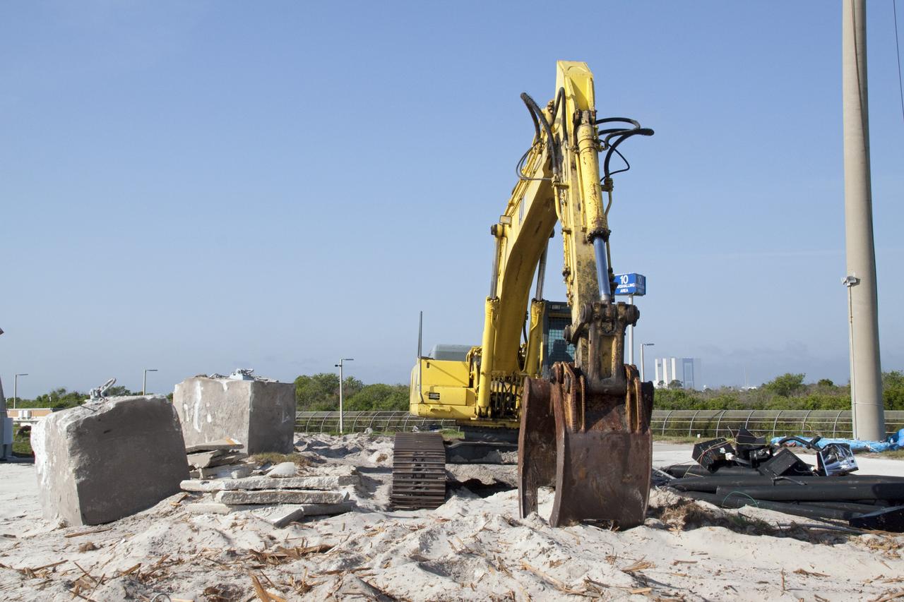 Cape Canaveral, Fla. -- At NASA's Kennedy Space Center in Florida, the emergency egress system that was part of Launch Pad 39B included seven baskets suspended from seven slidewires that extended from the pad to a landing zone 1,200 feet west of the pad. The system and the bunkers at the base also are being dismantled.      In 2009, the pad was no longer needed for the shuttle program, so it is being restructured for future use. Its new design will feature a "clean pad" for rockets to come with their own launcher, making it more versatile for a number of vehicles. The new lightning protection system, which was in place for the October 2009 launch of Ares I-X, will remain. For information on NASA's future plans, visit www.nasa.gov. Photo credit: NASA/Jack Pfaller