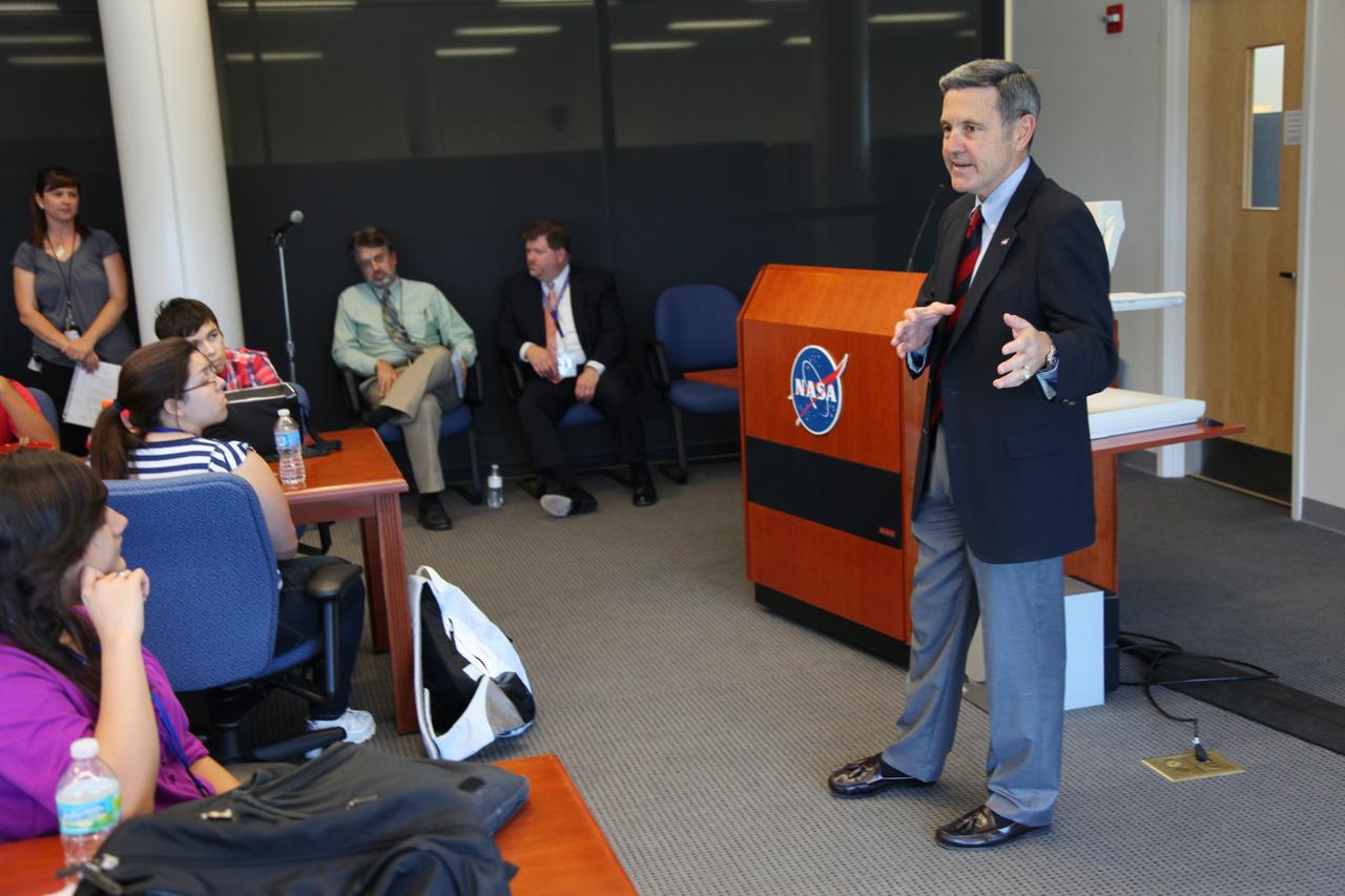 Cape Canaveral, Fla. -- Kennedy Center Director Bob Cabana speaks to the students after they participated in hands-on projects in Kennedy’s Space Life Sciences Laboratory (SLSL). High-school students from two Orlando, Fla., schools travelled to NASA’s Kennedy Space Center in Florida to participate in National Lab Day activities. During the event, about 80 students, toured various facilities and engaged in educational hands-on activities. National Lab Day is a partnership between federal agencies, foundations, professional societies and organizations devoted to promoting science, technology, engineering and math, or STEM, hands-on discovery-based laboratory experiences for students. Photo Credit: NASA/Frankie Martin
