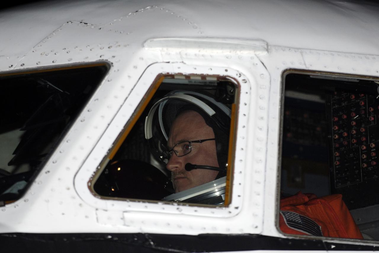 CAPE CANAVERAL, Fla. -- STS-134 Commander Mark Kelly prepares to perform touch-and-go landings aboard a Shuttle Training Aircraft (STA) on the Shuttle Landing Facility runway at NASA's Kennedy Space Center in Florida. An STA is a Gulfstream II jet that is modified to mimic the shuttle's handling during the final phase of landing. Kelly and Johnson will practice landings as part of standard training before space shuttle Endeavour's launch to the International Space Station. Endeavour and its crew will deliver the Express Logistics Carrier-3, Alpha Magnetic Spectrometer-2 (AMS), a high-pressure gas tank and additional spare parts for the Dextre robotic helper to the station. This will be the final spaceflight for Endeavour. For more information visit, www.nasa.gov/mission_pages/shuttle/shuttlemissions/sts134/index.html. Photo credit: NASA/Kim Shiflett