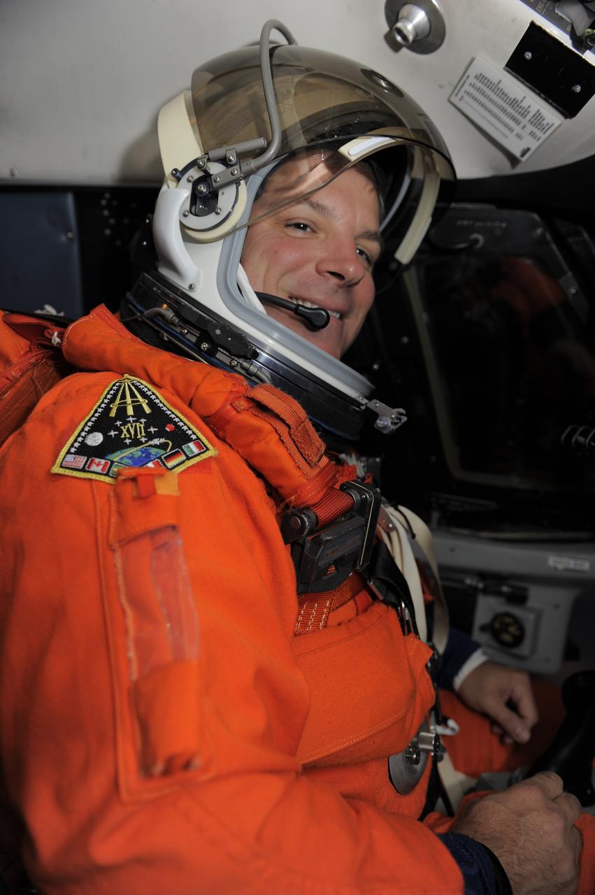 CAPE CANAVERAL, Fla. -- STS-134 Pilot Greg H. Johnson prepares to perform touch-and-go landings aboard a Shuttle Training Aircraft (STA) on the Shuttle Landing Facility runway at NASA's Kennedy Space Center in Florida. An STA is a Gulfstream II jet that is modified to mimic the shuttle's handling during the final phase of landing. Kelly and Johnson will practice landings as part of standard training before space shuttle Endeavour's launch to the International Space Station. Endeavour and its crew will deliver the Express Logistics Carrier-3, Alpha Magnetic Spectrometer-2 (AMS), a high-pressure gas tank and additional spare parts for the Dextre robotic helper to the station. This will be the final spaceflight for Endeavour. For more information visit, www.nasa.gov/mission_pages/shuttle/shuttlemissions/sts134/index.html. Photo credit: NASA/Kim Shiflett