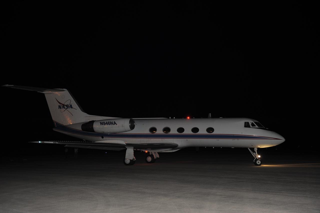 CAPE CANAVERAL, Fla. -- STS-134 Commander Mark Kelly and Pilot Greg H. Johnson return after performing touch-and-go landings aboard a Shuttle Training Aircraft (STA) on the Shuttle Landing Facility runway at NASA's Kennedy Space Center in Florida. An STA is a Gulfstream II jet that is modified to mimic the shuttle's handling during the final phase of landing. Kelly and Johnson will practice landings as part of standard training before space shuttle Endeavour's launch to the International Space Station. Endeavour and its crew will deliver the Express Logistics Carrier-3, Alpha Magnetic Spectrometer-2 (AMS), a high-pressure gas tank and additional spare parts for the Dextre robotic helper to the station. This will be the final spaceflight for Endeavour. For more information visit, www.nasa.gov/mission_pages/shuttle/shuttlemissions/sts134/index.html. Photo credit: NASA/Kim Shiflett