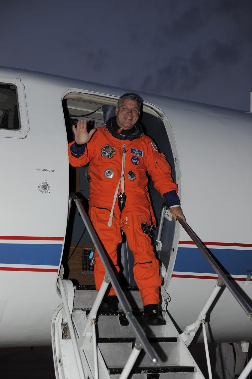 CAPE CANAVERAL, Fla. -- STS-134 Pilot Greg H. Johnson has completed touch-and-go landings and disembarks from a Shuttle Training Aircraft (STA) on the Shuttle Landing Facility runway at NASA's Kennedy Space Center in Florida. An STA is a Gulfstream II jet that is modified to mimic the shuttle's handling during the final phase of landing. Kelly and Johnson will practice landings as part of standard training before space shuttle Endeavour's launch to the International Space Station. Endeavour and its crew will deliver the Express Logistics Carrier-3, Alpha Magnetic Spectrometer-2 (AMS), a high-pressure gas tank and additional spare parts for the Dextre robotic helper to the station. This will be the final spaceflight for Endeavour. For more information visit, www.nasa.gov/mission_pages/shuttle/shuttlemissions/sts134/index.html. Photo credit: NASA/Kim Shiflett