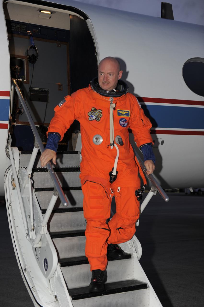 CAPE CANAVERAL, Fla. -- STS-134 Commander Mark Kelly has completed touch-and-go landings and disembarks from a Shuttle Training Aircraft (STA) on the Shuttle Landing Facility runway at NASA's Kennedy Space Center in Florida. An STA is a Gulfstream II jet that is modified to mimic the shuttle's handling during the final phase of landing. Kelly and Johnson will practice landings as part of standard training before space shuttle Endeavour's launch to the International Space Station. Endeavour and its crew will deliver the Express Logistics Carrier-3, Alpha Magnetic Spectrometer-2 (AMS), a high-pressure gas tank and additional spare parts for the Dextre robotic helper to the station. This will be the final spaceflight for Endeavour. For more information visit, www.nasa.gov/mission_pages/shuttle/shuttlemissions/sts134/index.html. Photo credit: NASA/Kim Shiflett