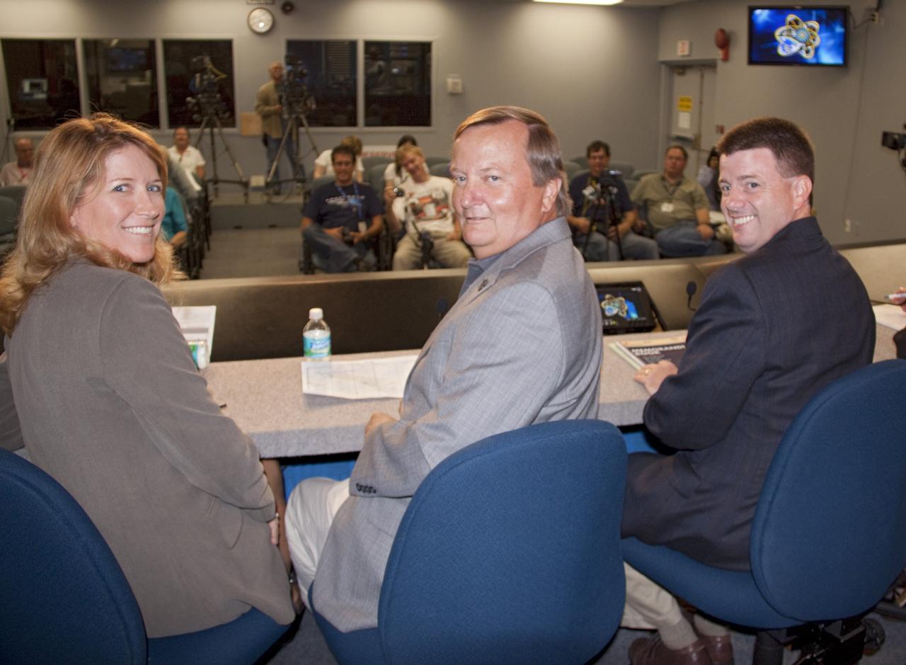 CAPE CANAVERAL, Fla. -- In the Press Site auditorium at NASA's Kennedy Space Center in Florida,  NASA managers brief media about their unanimous approval to proceed with space shuttle Endeavour's STS-134 mission. From left are Shuttle Weather Officer Kathy Winters, Shuttle Launch Director Mike Leinbach and Space Shuttle Program Launch Integration Manager Mike Moses.          Endeavour's launch is scheduled for May 16 at 8:56 a.m. EDT. Endeavour and its crew will deliver the Express Logistics Carrier-3, Alpha Magnetic Spectrometer-2 (AMS), a high-pressure gas tank and additional spare parts for the Dextre robotic helper to the station. This will be the final spaceflight for Endeavour. For more information visit, www.nasa.gov/mission_pages/shuttle/shuttlemissions/sts134/index.html. Photo credit: NASA/Ben Smegelsky