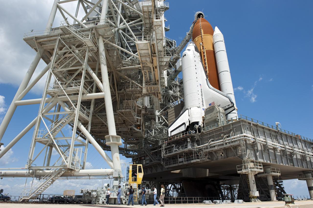 CAPE CANAVERAL, Fla. - At NASA's Kennedy Space Center in Florida, the rotating service structure (RSS) moves away from space shuttle Endeavour on Launch Pad 39A. The structure provides weather protection and access to the shuttle while it awaits lift off on the pad. RSS "rollback," as it's called, began at 11:44 a.m. EDT on May 15 and was completed at 12:24 p.m.         STS-134 will deliver the Alpha Magnetic Spectrometer-2 (AMS), Express Logistics Carrier-3, a high-pressure gas tank and additional spare parts for the Dextre robotic helper to the International Space Station. May 16 at 8:56 a.m. will be the second launch attempt for Endeavour. The first attempt on April 29 was scrubbed because of an issue associated with a faulty power distribution box called the aft load control assembly-2 (ALCA-2). STS-134 will be the final spaceflight for Endeavour. For more information visit, www.nasa.gov/mission_pages/shuttle/shuttlemissions/sts134/index.html. Photo credit: NASA/Kim Shiflett
