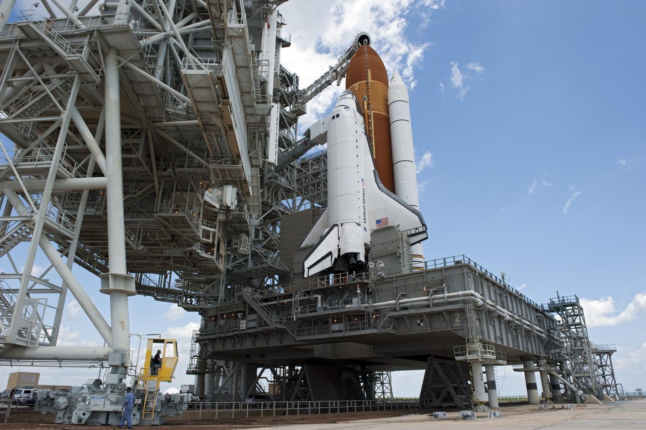 CAPE CANAVERAL, Fla. - At NASA's Kennedy Space Center in Florida, the rotating service structure (RSS) moves away from space shuttle Endeavour on Launch Pad 39A. The structure provides weather protection and access to the shuttle while it awaits lift off on the pad. RSS "rollback," as it's called, began at 11:44 a.m. EDT on May 15 and was completed at 12:24 p.m.       STS-134 will deliver the Alpha Magnetic Spectrometer-2 (AMS), Express Logistics Carrier-3, a high-pressure gas tank and additional spare parts for the Dextre robotic helper to the International Space Station. May 16 at 8:56 a.m. will be the second launch attempt for Endeavour. The first attempt on April 29 was scrubbed because of an issue associated with a faulty power distribution box called the aft load control assembly-2 (ALCA-2). STS-134 will be the final spaceflight for Endeavour. For more information visit, www.nasa.gov/mission_pages/shuttle/shuttlemissions/sts134/index.html. Photo credit: NASA/Kim Shiflett