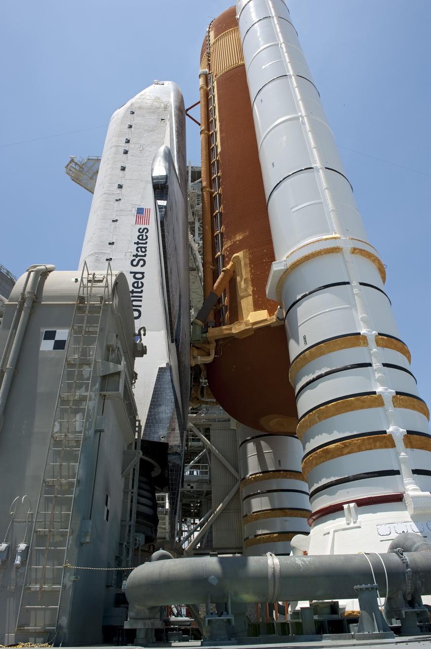 CAPE CANAVERAL, Fla. - At NASA's Kennedy Space Center in Florida, space shuttle Endeavour is revealed on Launch Pad 39A at NASA's Kennedy Space Center in Florida following the move of the rotating service structure (RSS). The structure provides weather protection and access to the shuttle while it awaits lift off on the pad. RSS "rollback," as it's called, began at 11:44 a.m. EDT on May 15 and was completed at 12:24 p.m.       STS-134 will deliver the Alpha Magnetic Spectrometer-2 (AMS), Express Logistics Carrier-3, a high-pressure gas tank and additional spare parts for the Dextre robotic helper to the International Space Station. May 16 at 8:56 a.m. will be the second launch attempt for Endeavour. The first attempt on April 29 was scrubbed because of an issue associated with a faulty power distribution box called the aft load control assembly-2 (ALCA-2). STS-134 will be the final spaceflight for Endeavour. For more information visit, www.nasa.gov/mission_pages/shuttle/shuttlemissions/sts134/index.html. Photo credit: NASA/Kim Shiflett