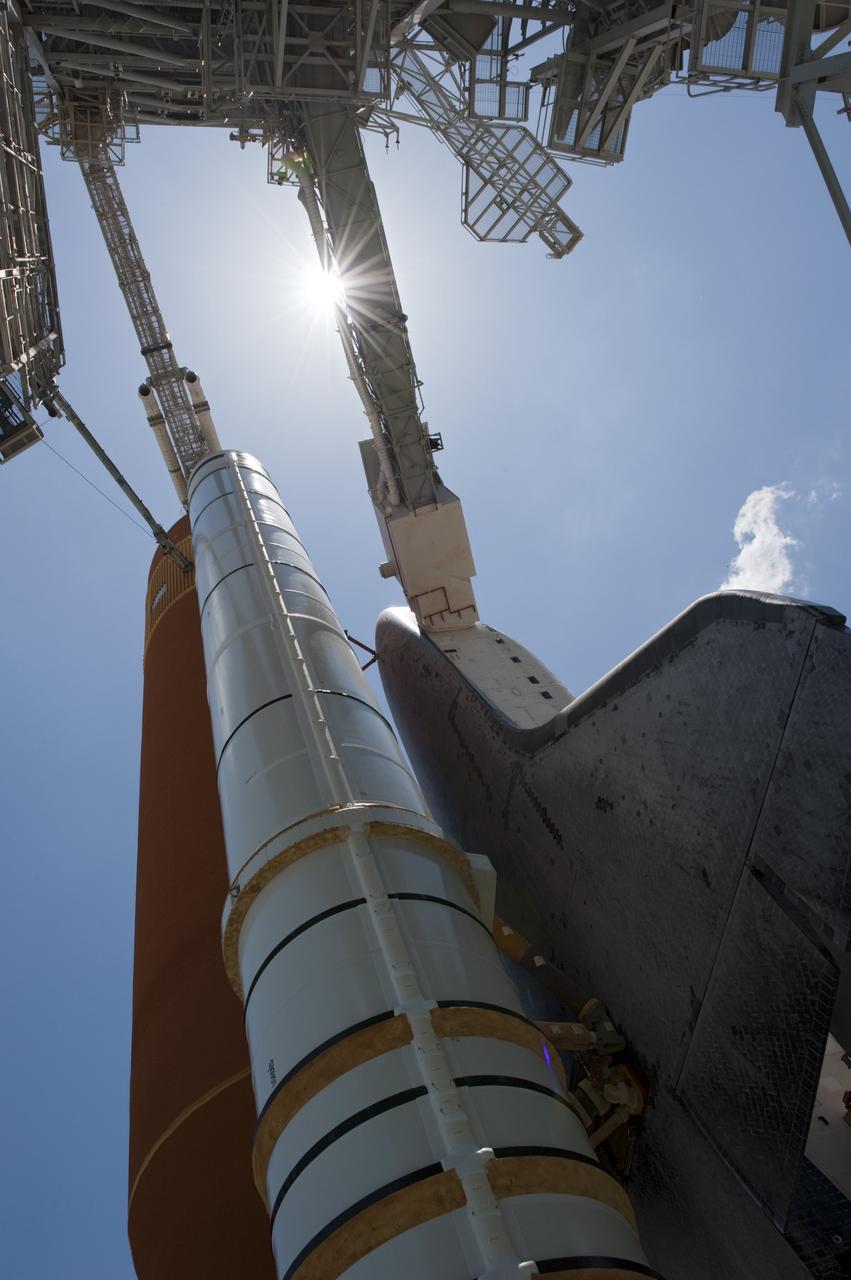 CAPE CANAVERAL, Fla. - At NASA's Kennedy Space Center in Florida, space shuttle Endeavour is revealed on Launch Pad 39A at NASA's Kennedy Space Center in Florida following the move of the rotating service structure (RSS). The structure provides weather protection and access to the shuttle while it awaits lift off on the pad. RSS "rollback," as it's called, began at 11:44 a.m. EDT on May 15 and was completed at 12:24 p.m.     STS-134 will deliver the Alpha Magnetic Spectrometer-2 (AMS), Express Logistics Carrier-3, a high-pressure gas tank and additional spare parts for the Dextre robotic helper to the International Space Station. May 16 at 8:56 a.m. will be the second launch attempt for Endeavour. The first attempt on April 29 was scrubbed because of an issue associated with a faulty power distribution box called the aft load control assembly-2 (ALCA-2). STS-134 will be the final spaceflight for Endeavour. For more information visit, www.nasa.gov/mission_pages/shuttle/shuttlemissions/sts134/index.html. Photo credit: NASA/Kim Shiflett