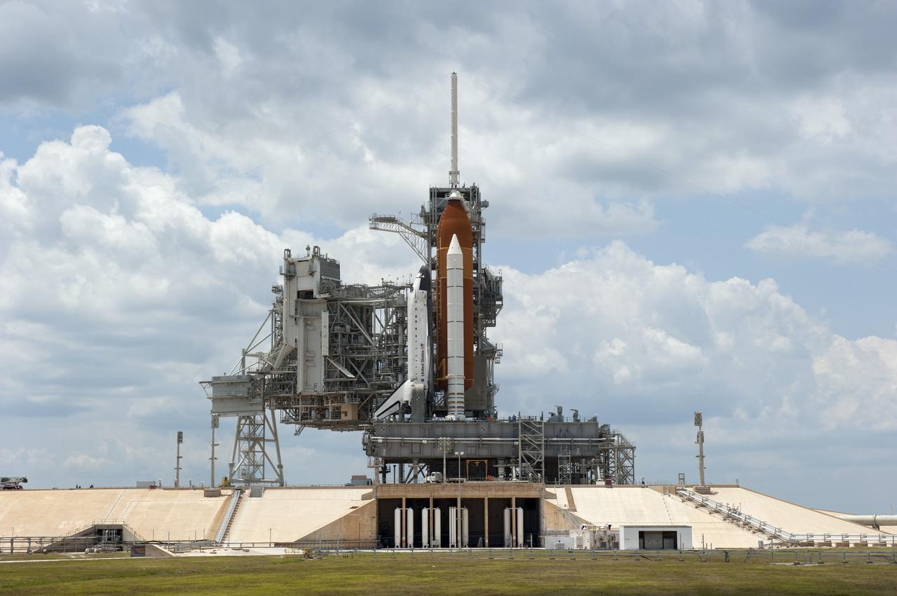 CAPE CANAVERAL, Fla. -- At NASA's Kennedy Space Center in Florida, space shuttle Endeavour stands majestically on Launch Pad 39A, totally revealed after the rotating service structure (RSS) was rolled away in preparation for the shuttle's upcoming launch. Retraction of the structure, which provides weather protection and access to the shuttle, began at 11:44 a.m. EDT and was completed at 12:24 p.m.            RSS "rollback" marks a major milestone in Endeavour's STS-134 mission countdown. Liftoff is scheduled for May 16 at 8:56 a.m. EDT. Endeavour and its crew will deliver the Express Logistics Carrier-3, Alpha Magnetic Spectrometer-2 (AMS), a high-pressure gas tank and additional spare parts for the Dextre robotic helper to the station. This will be the final spaceflight for Endeavour. For more information visit, www.nasa.gov/mission_pages/shuttle/shuttlemissions/sts134/index.html. Photo credit: NASA/Kim Shiflett