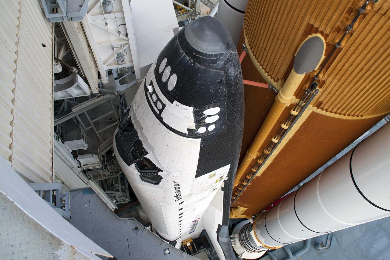 CAPE CANAVERAL, Fla. - At NASA's Kennedy Space Center in Florida, the rotating service structure (RSS) moves away from space shuttle Endeavour on Launch Pad 39A. The structure provides weather protection and access to the shuttle while it awaits lift off on the pad. RSS "rollback," as it's called, began at 11:44 a.m. EDT on May 15 and was completed at 12:24 p.m.             STS-134 will deliver the Alpha Magnetic Spectrometer-2 (AMS), Express Logistics Carrier-3, a high-pressure gas tank and additional spare parts for the Dextre robotic helper to the International Space Station. May 16 at 8:56 a.m. will be the second launch attempt for Endeavour. The first attempt on April 29 was scrubbed because of an issue associated with a faulty power distribution box called the aft load control assembly-2 (ALCA-2). STS-134 will be the final spaceflight for Endeavour. For more information visit, www.nasa.gov/mission_pages/shuttle/shuttlemissions/sts134/index.html. Photo credit: NASA/Jack Pfaller