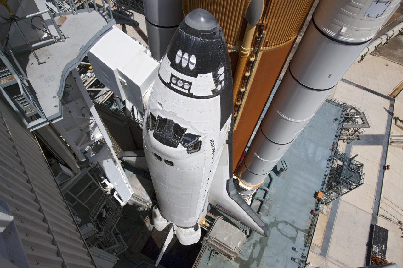 CAPE CANAVERAL, Fla. - At NASA's Kennedy Space Center in Florida, the rotating service structure (RSS) moves away from space shuttle Endeavour on Launch Pad 39A. The structure provides weather protection and access to the shuttle while it awaits lift off on the pad. RSS "rollback," as it's called, began at 11:44 a.m. EDT on May 15 and was completed at 12:24 p.m.         STS-134 will deliver the Alpha Magnetic Spectrometer-2 (AMS), Express Logistics Carrier-3, a high-pressure gas tank and additional spare parts for the Dextre robotic helper to the International Space Station. May 16 at 8:56 a.m. will be the second launch attempt for Endeavour. The first attempt on April 29 was scrubbed because of an issue associated with a faulty power distribution box called the aft load control assembly-2 (ALCA-2). STS-134 will be the final spaceflight for Endeavour. For more information visit, www.nasa.gov/mission_pages/shuttle/shuttlemissions/sts134/index.html. Photo credit: NASA/Jack Pfaller