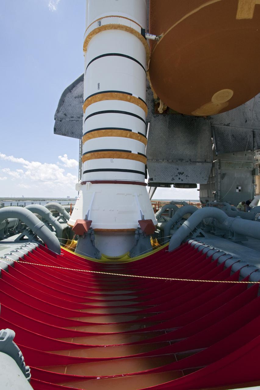 CAPE CANAVERAL, Fla. - Water bags, called red water sausages, are revealed on Launch Pad 39A at NASA's Kennedy Space Center in Florida following the move of the rotating service structure (RSS). RSS "rollback," as it's called, began at 11:44 a.m. EDT on May 15 and was completed at 12:24 p.m. The bags will dampen the wave of sound energy that is reflected back up toward space shuttle Endeavour when the solid rocket boosters ignite during launch. They suppress the powerful pulse of pressure to prevent dangerous stress on the wings of the shuttle.         STS-134 will deliver the Alpha Magnetic Spectrometer-2 (AMS), Express Logistics Carrier-3, a high-pressure gas tank and additional spare parts for the Dextre robotic helper to the International Space Station. May 16 at 8:56 a.m. will be the second launch attempt for Endeavour. The first attempt on April 29 was scrubbed because of an issue associated with a faulty power distribution box called the aft load control assembly-2 (ALCA-2). STS-134 will be the final spaceflight for Endeavour. For more information visit, www.nasa.gov/mission_pages/shuttle/shuttlemissions/sts134/index.html. Photo credit: NASA/Jack Pfaller