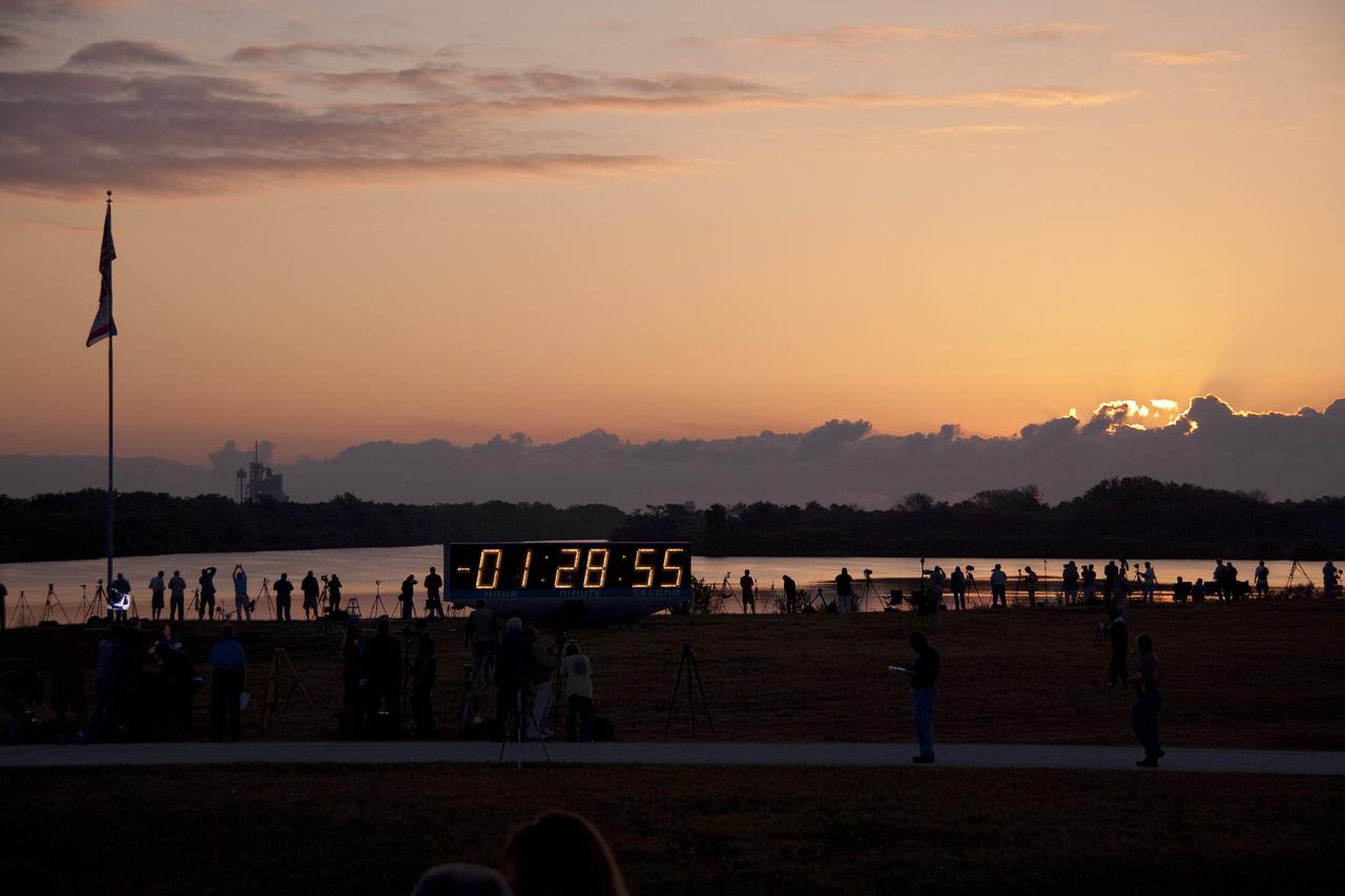 CAPE CANAVERAL, Fla. -- As the sun rises and paints a colorful skyline across NASA's Kennedy Space Center in Florida, media set up their cameras at the countdown clock in the Launch Complex 39 area. At 8:56 a.m. EDT on May 16, space shuttle Endeavour and its six-member STS-134 crew are scheduled to lift off Launch Pad 39A on a mission to the International Space Station.         STS-134 will deliver the Alpha Magnetic Spectrometer-2 (AMS), Express Logistics Carrier-3, a high-pressure gas tank and additional spare parts for the Dextre robotic helper to the International Space Station. This will be the second launch attempt for Endeavour. The first attempt on April 29 was scrubbed because of an issue associated with a faulty power distribution box called the aft load control assembly-2 (ALCA-2). STS-134 will be the final spaceflight for Endeavour. For more information visit, www.nasa.gov/mission_pages/shuttle/shuttlemissions/sts134/index.html. Photo credit: NASA/Troy Cryder