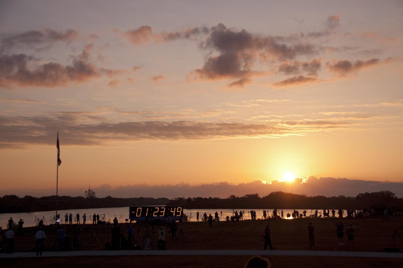 CAPE CANAVERAL, Fla. -- As the sun rises and paints a colorful skyline across NASA's Kennedy Space Center in Florida, media set up their cameras at the countdown clock in the Launch Complex 39 area. At 8:56 a.m. EDT on May 16, space shuttle Endeavour and its six-member STS-134 crew are scheduled to lift off Launch Pad 39A on a mission to the International Space Station.           STS-134 will deliver the Alpha Magnetic Spectrometer-2 (AMS), Express Logistics Carrier-3, a high-pressure gas tank and additional spare parts for the Dextre robotic helper to the International Space Station. This will be the second launch attempt for Endeavour. The first attempt on April 29 was scrubbed because of an issue associated with a faulty power distribution box called the aft load control assembly-2 (ALCA-2). STS-134 will be the final spaceflight for Endeavour. For more information visit, www.nasa.gov/mission_pages/shuttle/shuttlemissions/sts134/index.html. Photo credit: NASA/Troy Cryder