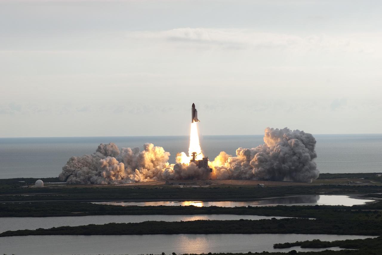 CAPE CANAVERAL, Fla. -- Rising on twin columns of fire and kicking up a trail of smoke and steam, space shuttle Endeavour lifts off from its seaside launch pad at NASA's Kennedy Space Center in Florida. Endeavour began its final flight, the STS-134 mission, to the International Space Station on time at 8:56 a.m. EDT on May 16.        Endeavour and its six-member crew are embarking on a mission to deliver the Alpha Magnetic Spectrometer-2 (AMS), Express Logistics Carrier-3, a high-pressure gas tank and additional spare parts for the Dextre robotic helper to the space station. Endeavour's first launch attempt on April 29 was scrubbed because of an issue associated with a faulty power distribution box called the aft load control assembly-2 (ALCA-2). For more information visit, www.nasa.gov/mission_pages/shuttle/shuttlemissions/sts134/index.html. Photo credit: NASA/Jim Grossmann
