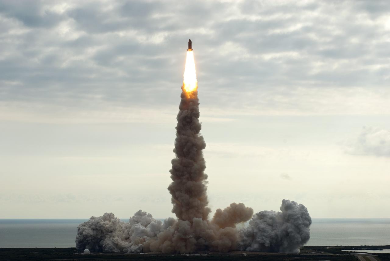 CAPE CANAVERAL, Fla. -- Rising on twin columns of fire and kicking up a trail of smoke and steam, space shuttle Endeavour lifts off from its seaside launch pad at NASA's Kennedy Space Center in Florida. Endeavour began its final flight, the STS-134 mission, to the International Space Station on time at 8:56 a.m. EDT on May 16.      Endeavour and its six-member crew are embarking on a mission to deliver the Alpha Magnetic Spectrometer-2 (AMS), Express Logistics Carrier-3, a high-pressure gas tank and additional spare parts for the Dextre robotic helper to the space station. Endeavour's first launch attempt on April 29 was scrubbed because of an issue associated with a faulty power distribution box called the aft load control assembly-2 (ALCA-2). For more information visit, www.nasa.gov/mission_pages/shuttle/shuttlemissions/sts134/index.html. Photo credit: NASA/Jim Grossmann