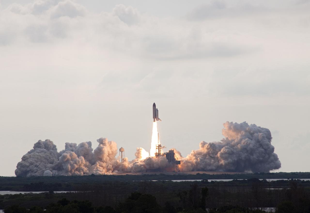 CAPE CANAVERAL, Fla. -- Kicking up a trail of smoke and steam, space shuttle Endeavour lifts off from Launch Pad 39A at NASA's Kennedy Space Center in Florida. Endeavour began its final flight, the STS-134 mission to the International Space Station, on time at 8:56 a.m. EDT on May 16.    Endeavour and its six-member crew are embarking on a mission to deliver the Alpha Magnetic Spectrometer-2 (AMS), Express Logistics Carrier-3, a high-pressure gas tank and additional spare parts for the Dextre robotic helper to the space station. Endeavour's first launch attempt on April 29 was scrubbed because of an issue associated with a faulty power distribution box called the aft load control assembly-2 (ALCA-2). For more information, visit www.nasa.gov/mission_pages/shuttle/shuttlemissions/sts134/index.html. Photo credit: NASA/Jack Pfaller