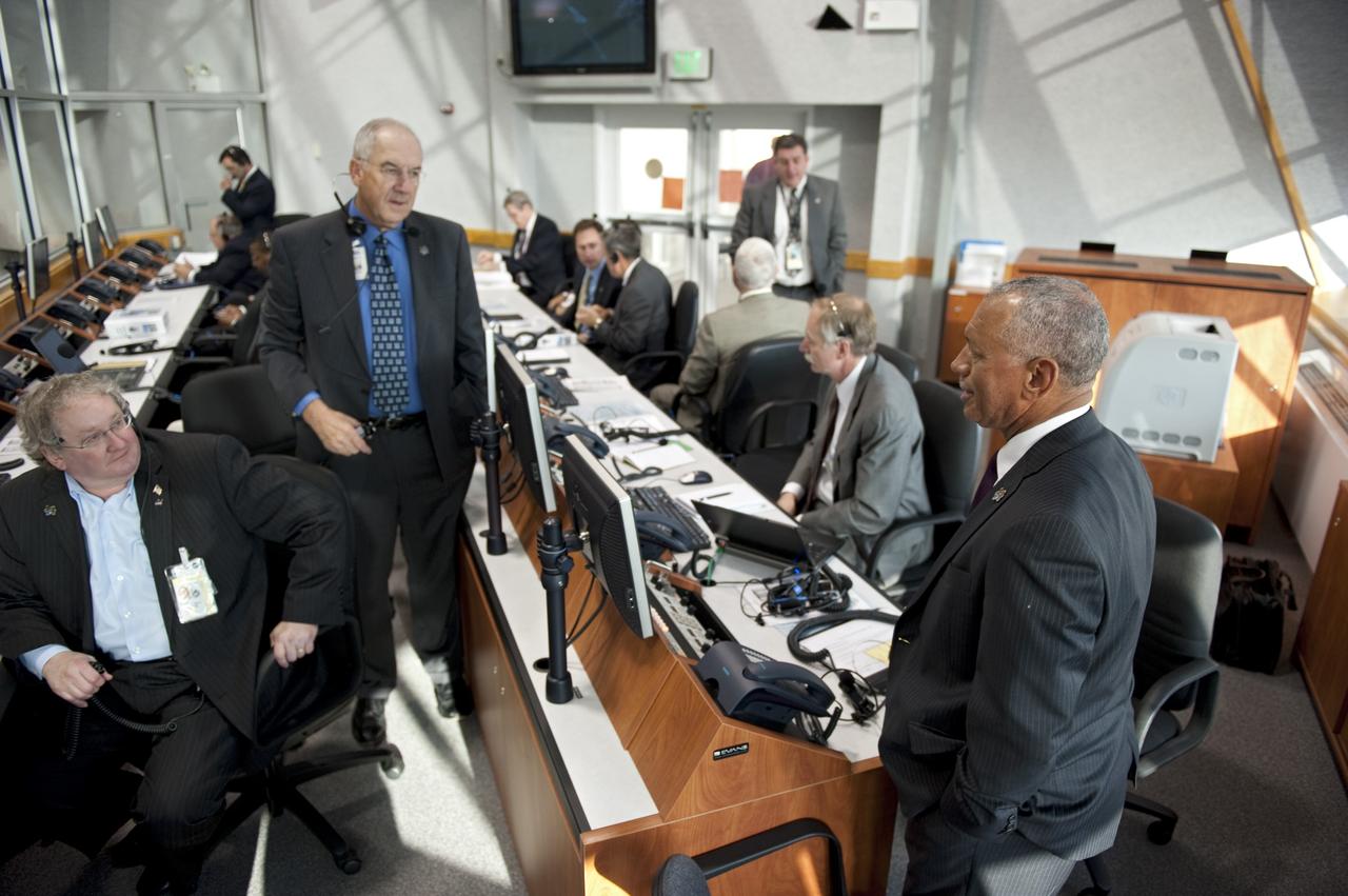 CAPE CANAVERAL, Fla. - NASA Administrator Charlie Bolden, right,  monitors the countdown to liftoff of space shuttle Endeavour in Firing Room 4 of the Launch Control Center at NASA's Kennedy Space Center in Florida. Endeavour lifted off on its STS-134 mission to the International Space Station on time at 8:56 a.m. EDT on May 16.    The shuttle and its six-member crew are embarking on a mission to deliver the Alpha Magnetic Spectrometer-2 (AMS), Express Logistics Carrier-3, a high-pressure gas tank and additional spare parts for the Dextre robotic helper to the space station. Endeavour's first launch attempt on April 29 was scrubbed because of an issue associated with a faulty power distribution box called the aft load control assembly-2 (ALCA-2). For more information visit, www.nasa.gov/mission_pages/shuttle/shuttlemissions/sts134/index.html. Photo credit: NASA/Kim Shiflett