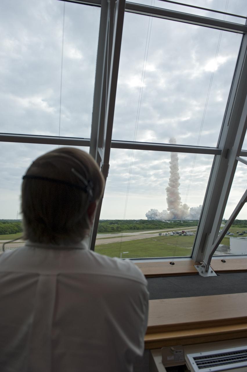 CAPE CANAVERAL, Fla. - Shuttle Launch Director Mike Leinbach watches space shuttle Endeavour soar into space from  Firing Room 4 of the Launch Control Center at NASA's Kennedy Space Center in Florida. Endeavour lifted off on its STS-134 mission to the International Space Station on time at 8:56 a.m. EDT on May 16.    The shuttle and its six-member crew are embarking on a mission to deliver the Alpha Magnetic Spectrometer-2 (AMS), Express Logistics Carrier-3, a high-pressure gas tank and additional spare parts for the Dextre robotic helper to the space station. Endeavour's first launch attempt on April 29 was scrubbed because of an issue associated with a faulty power distribution box called the aft load control assembly-2 (ALCA-2). For more information visit, www.nasa.gov/mission_pages/shuttle/shuttlemissions/sts134/index.html. Photo credit: NASA/Kim Shiflett